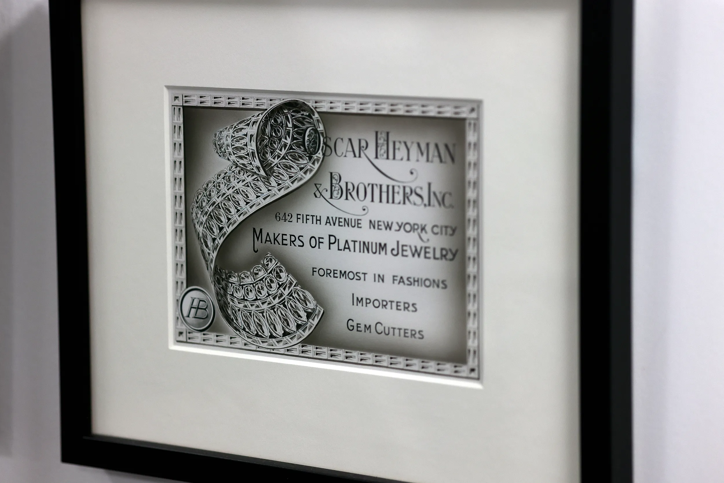 <p>Advertisements dating back to the mid 1900s line the walls of the office, a reminder of the brand&#8217;s deep roots in the jewelry industry</p>
