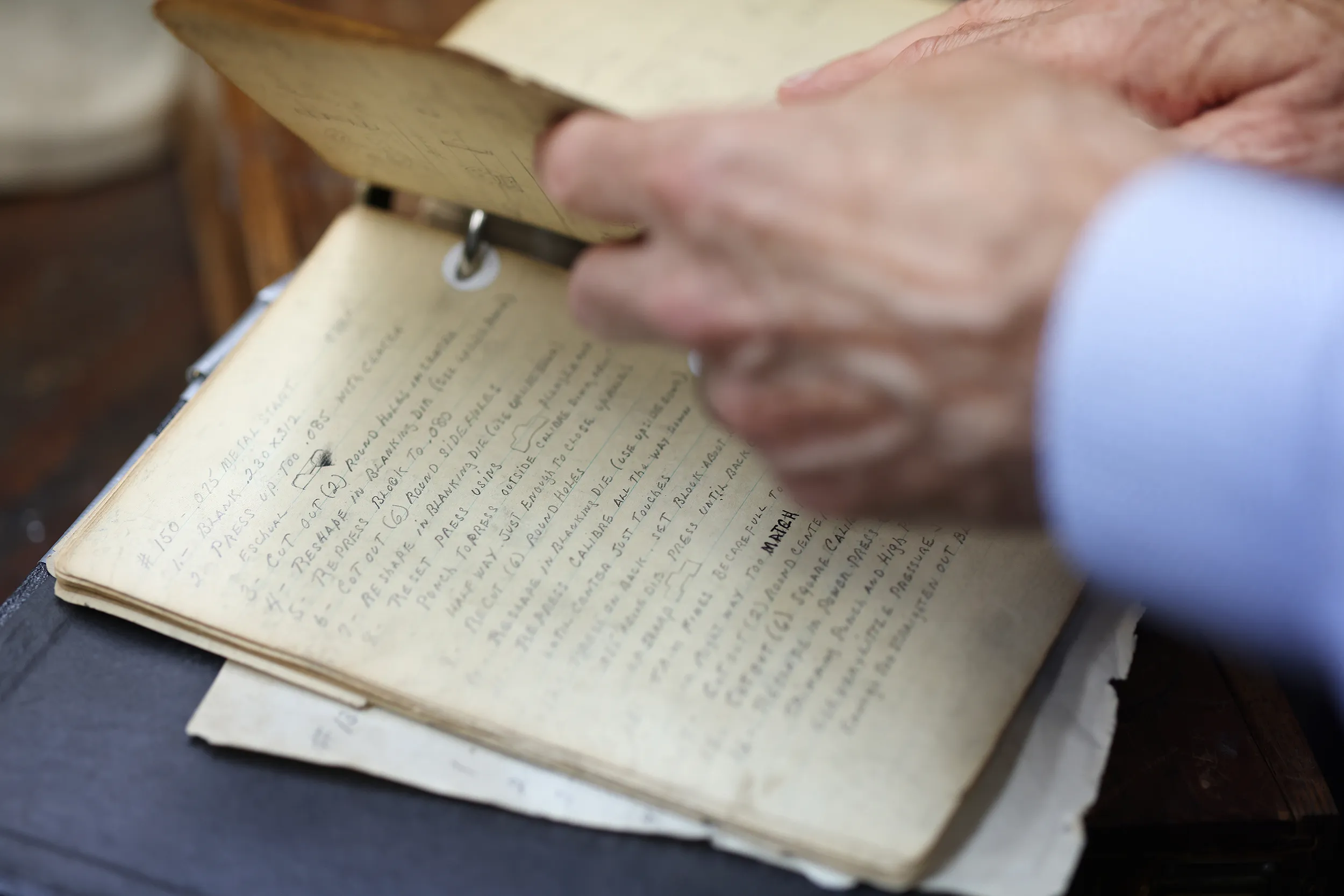 <p>Before computers, all steps for making each individual component were recorded in a notebook. These notebooks are still a north star that guides the team in bringing intricate parts to life</p>
