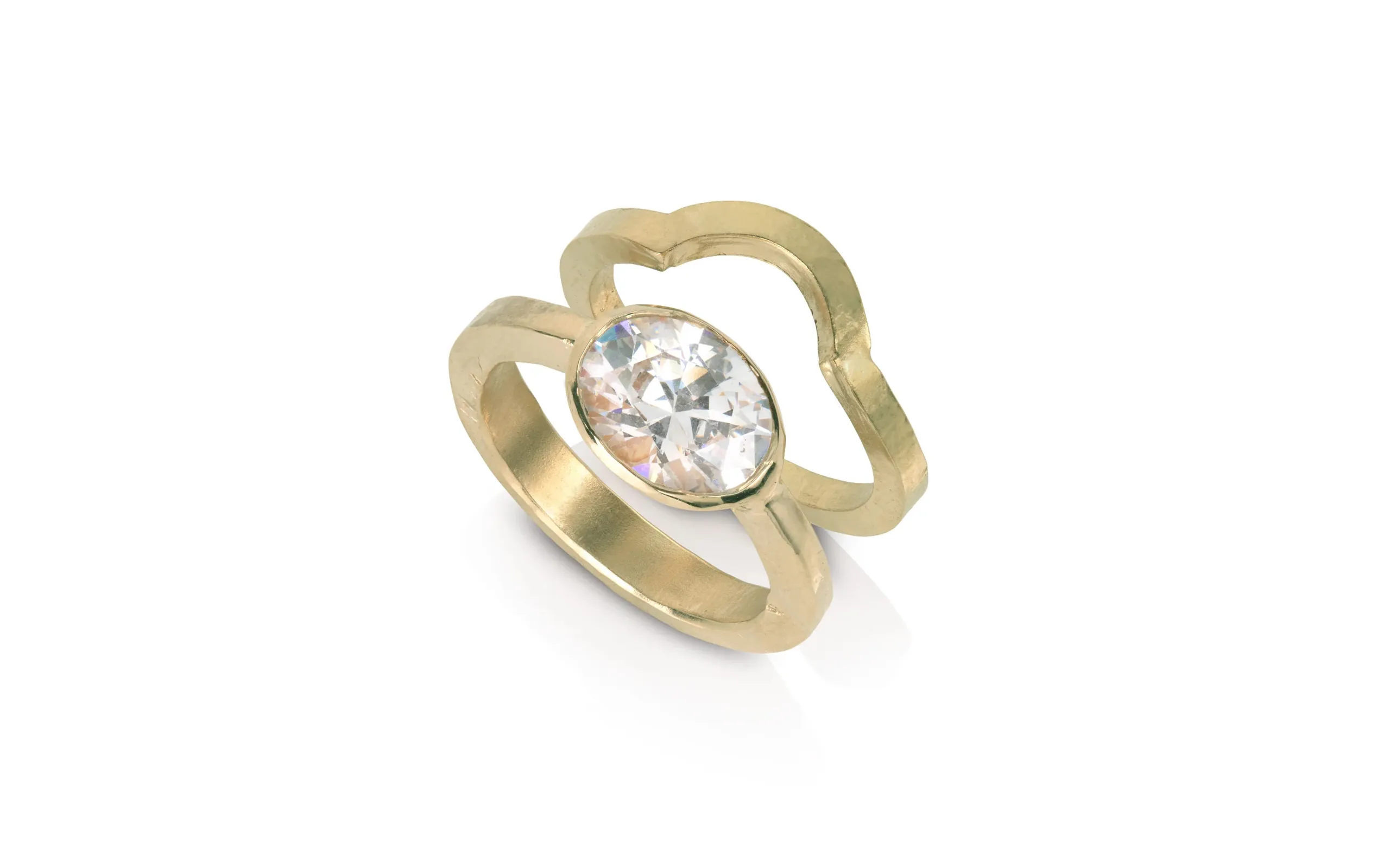 <p>Kitty Joyas Adore You ring stack in 14K recycled yellow gold, set east-west with an oval diamond</p>
