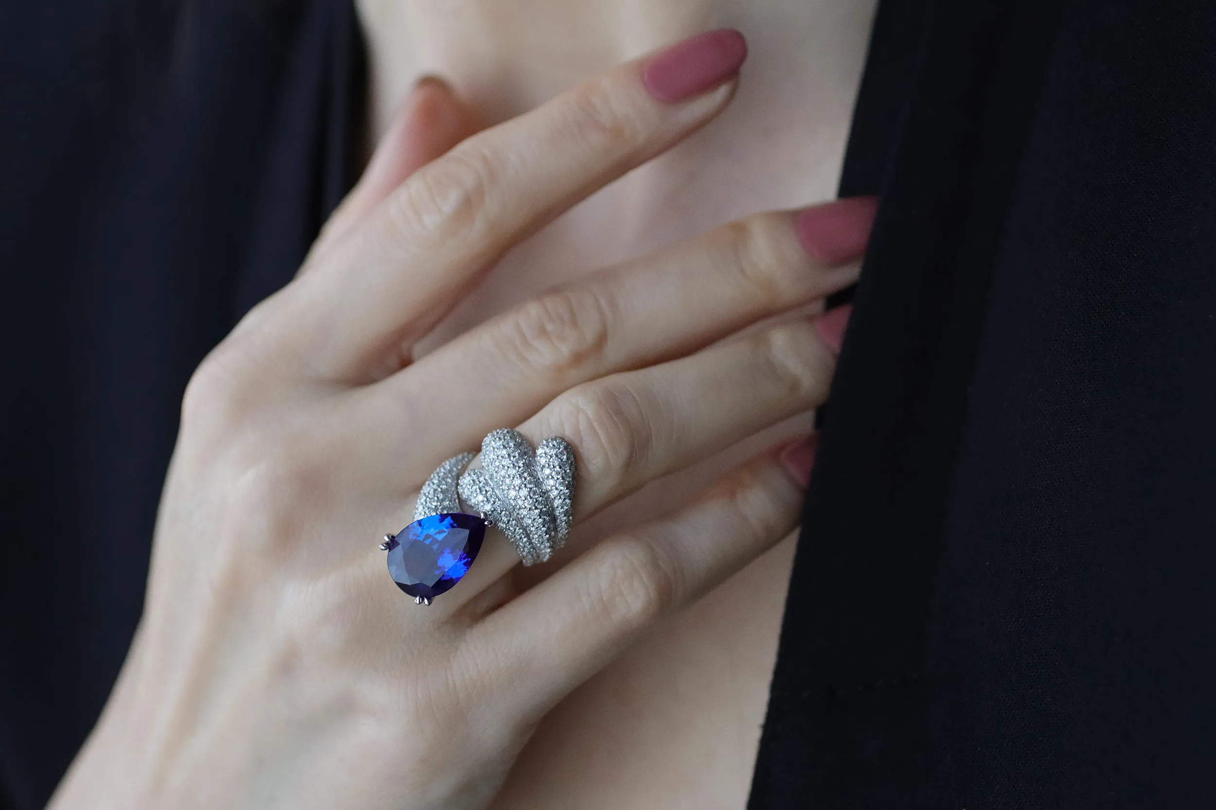 <p>The second Lumen of Grace ring in 18k white gold, <span class="TextRun  BCX0 SCXP150548781" lang="EN-US" xml:lang="EN-US" data-scheme-color="@000000,," data-usefontface="true" data-contrast="none"><span class="NormalTextRun  BCX0 SCXP150548781">set with white </span></span><span class="TextRun  BCX0 SCXP150548781" lang="EN-US" xml:lang="EN-US" data-scheme-color="@000000,," data-usefontface="true" data-contrast="none"><span class="NormalTextRun  BCX0 SCXP150548781">diamonds totalling 7 carats and</span></span> <span class="TextRun  BCX0 SCXP150548781" lang="EN-US" xml:lang="EN-US" data-scheme-color="@000000,," data-usefontface="true" data-contrast="none"><span class="NormalTextRun  BCX0 SCXP150548781">a rare pear shape tanzanite of </span></span><span class="TextRun  BCX0 SCXP150548781" lang="EN-US" xml:lang="EN-US" data-scheme-color="@000000,," data-usefontface="true" data-contrast="none"><span class="NormalTextRun  BCX0 SCXP150548781">around 8 carats</span></span></p>
