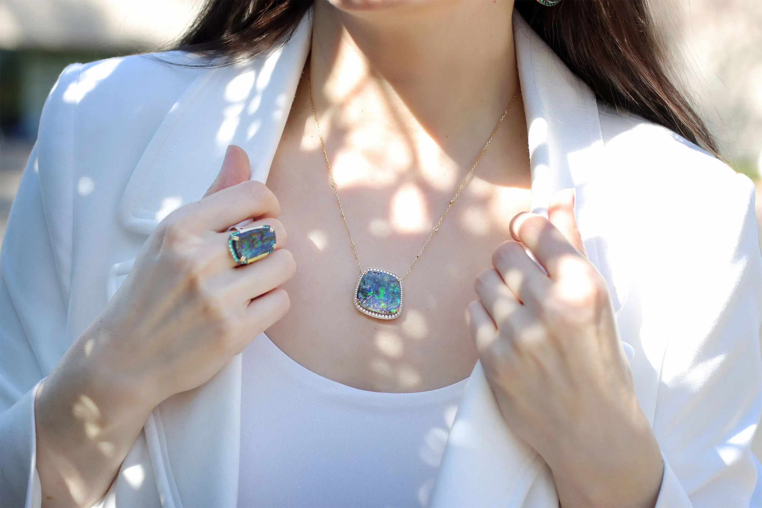 <p>Katerina Perez wears a matching pair of Australian boulder opal jewels at the Centurion Jewelry Show in February</p>