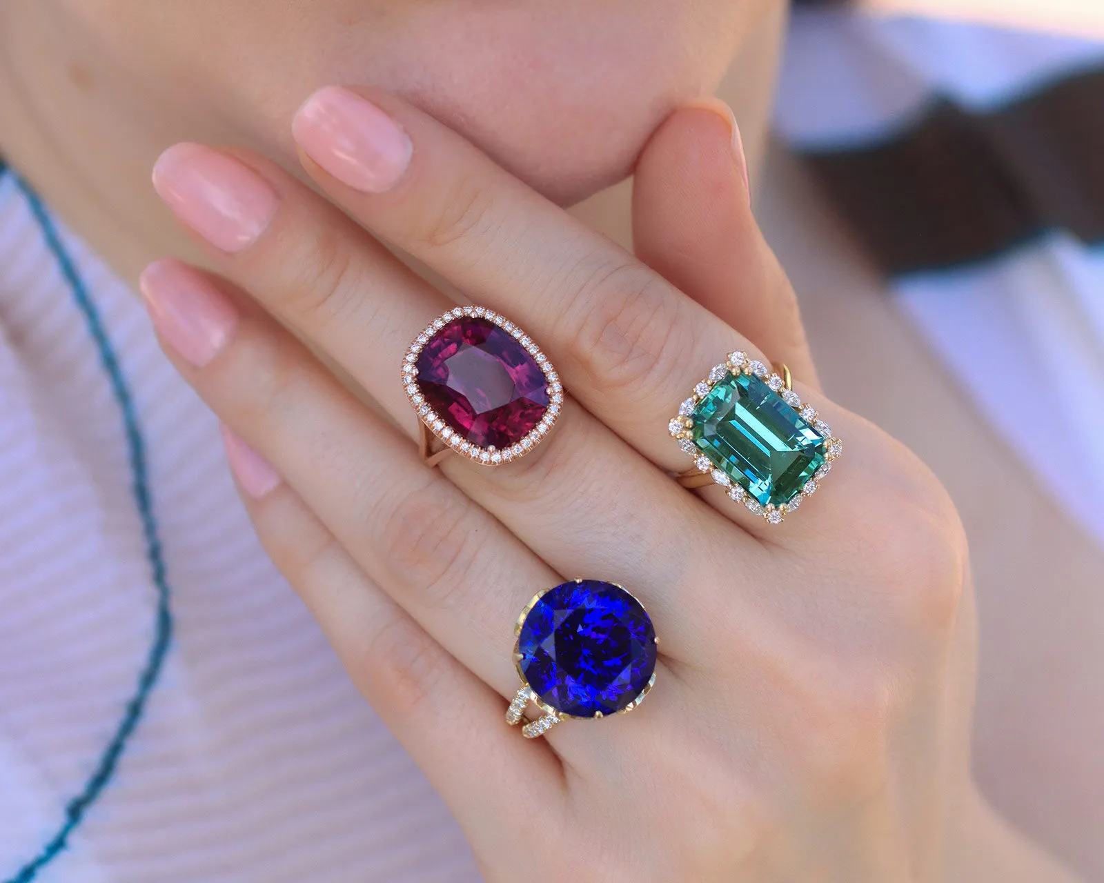 <p>A selection of Lisa Nik cocktail rings from the Colors collection, including a round tanzanite, a cushion-shaped rubellite, and an emerald-cut indicolite tourmaline</p>
