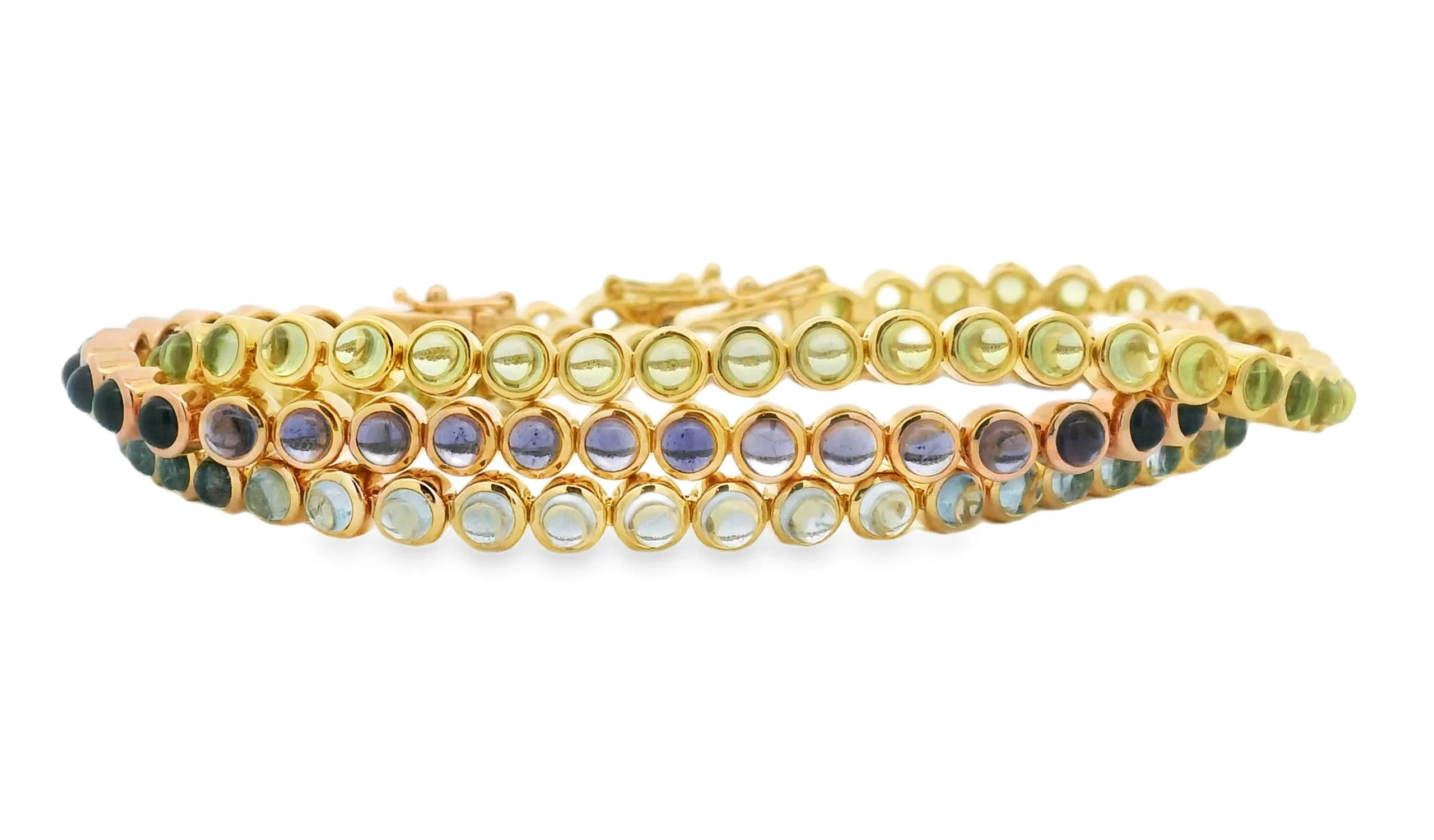 <p>Lisa Nik bracelets from the Rainbow collection with iolite, aquamarine and peridot in 18k yellow gold</p>
