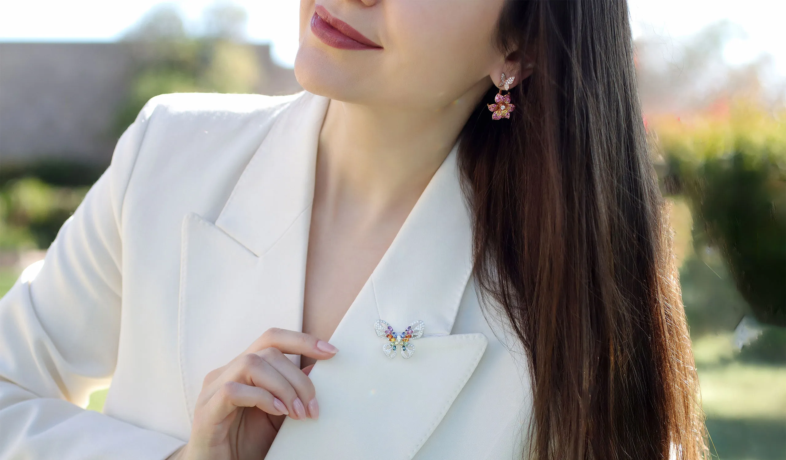 <p>Katerina Perez wears flower and butterfly-inspired creations from the Lisa Nik Rainbow collection</p>
