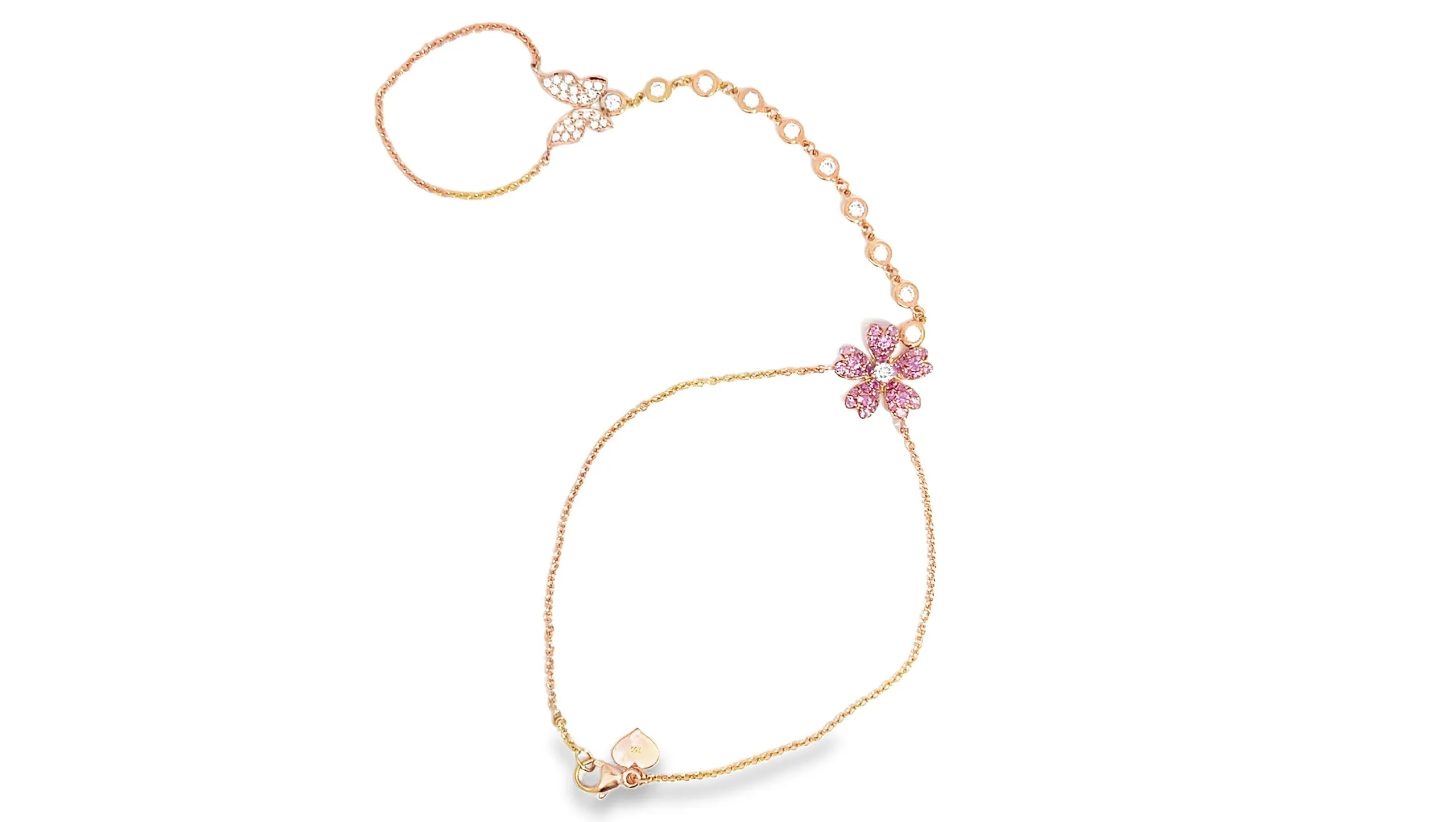 <p>This Lisa Nik hand chain from the Rainbow collection, set with pink sapphires and diamonds in 18k rose gold, evokes the Air element</p>
