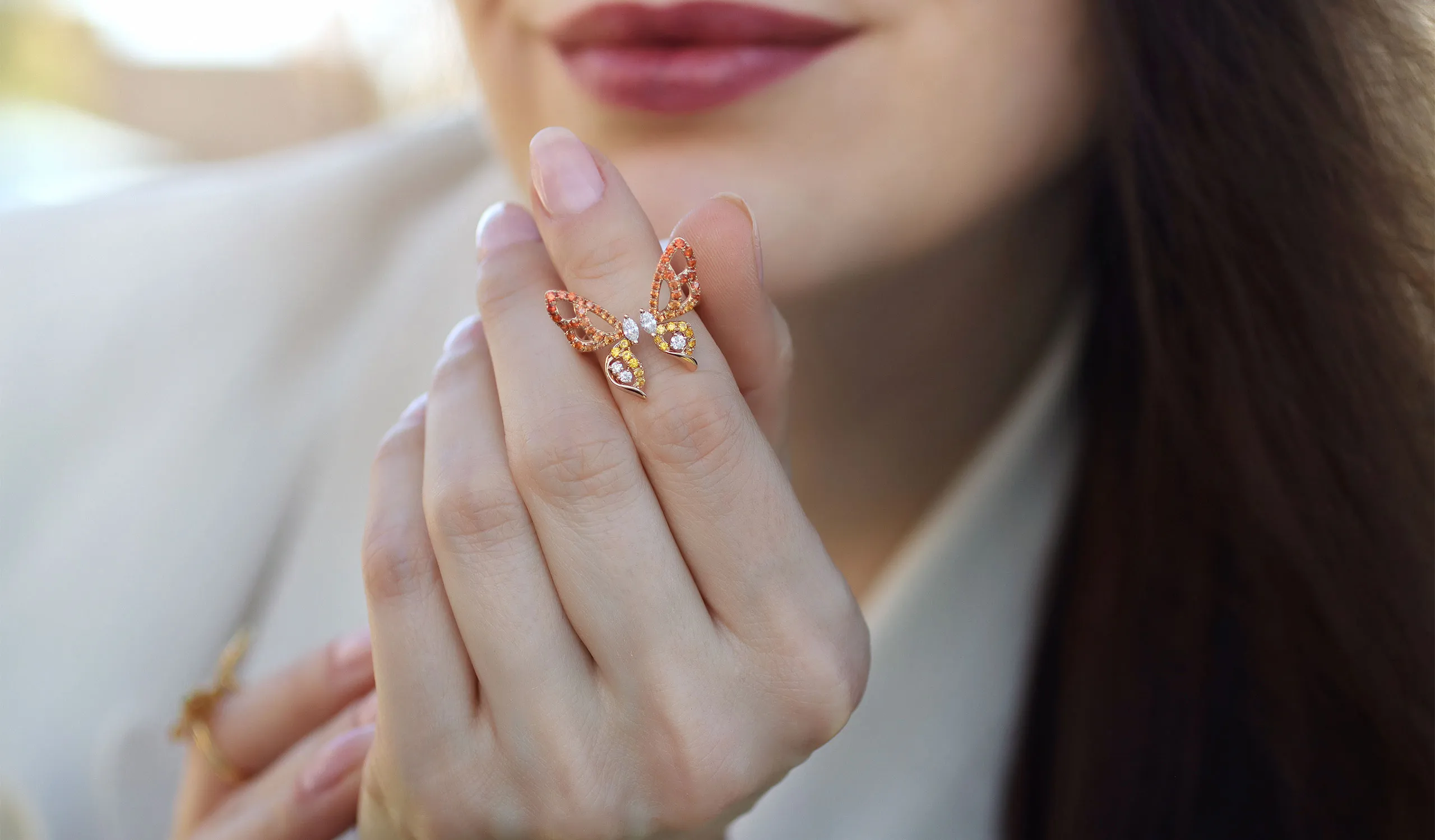 <p>Lisa Nik Butterfly ring from the Rainbow collection, set with orange and yellow sapphires and diamonds in 18k rose gold</p>
