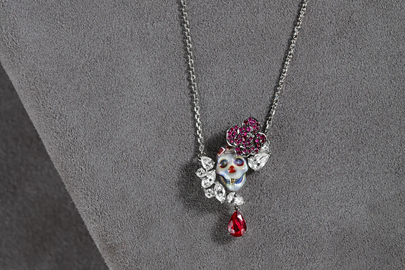<p>Liza Borzaya pendant with diamonds, rubies and enamel details from the ‘Get Inked!’ collection</p>