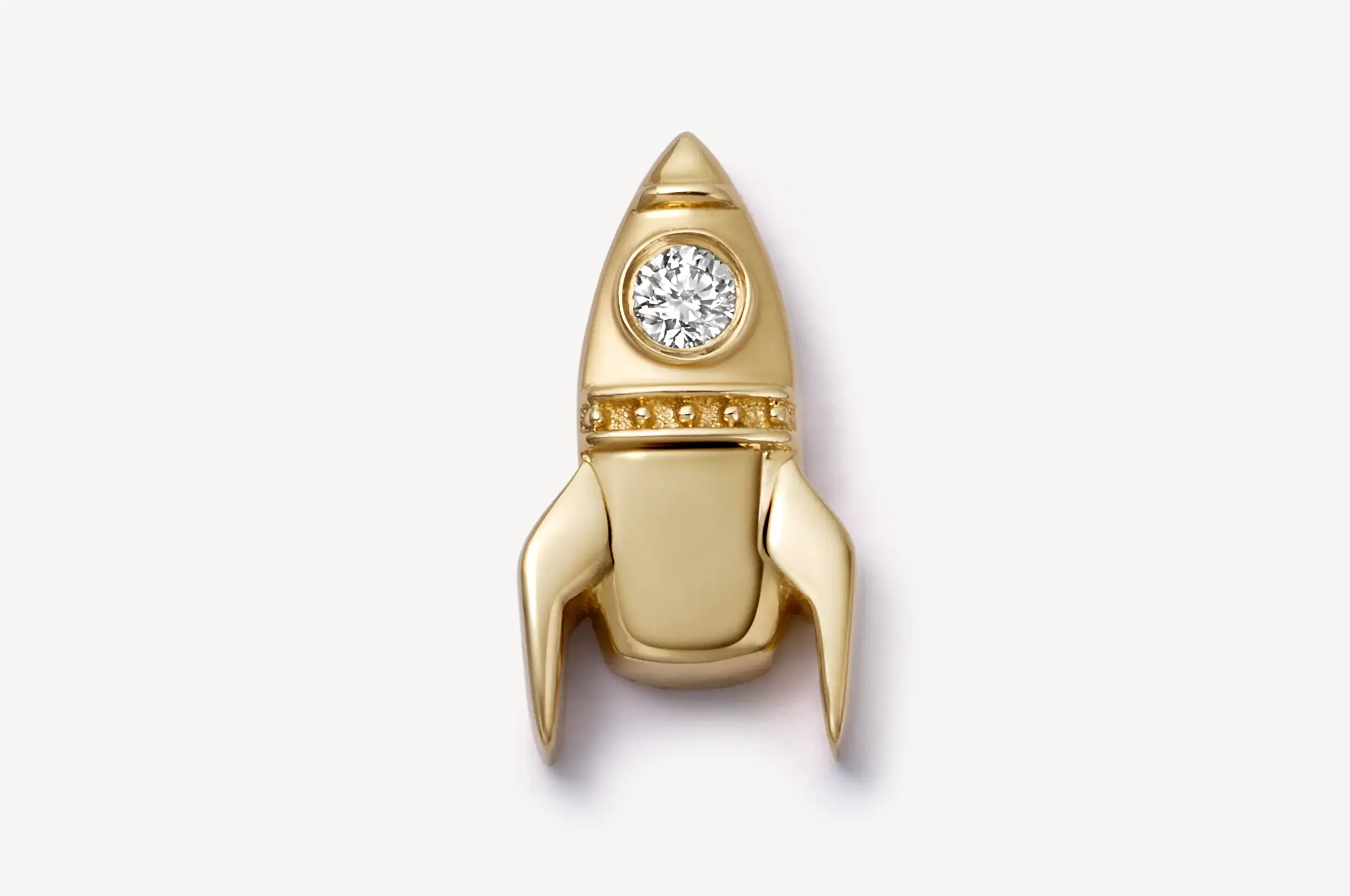 The collection also includes a series of all diamond charms crafted in 18k yellow gold and designed to be collected over time.