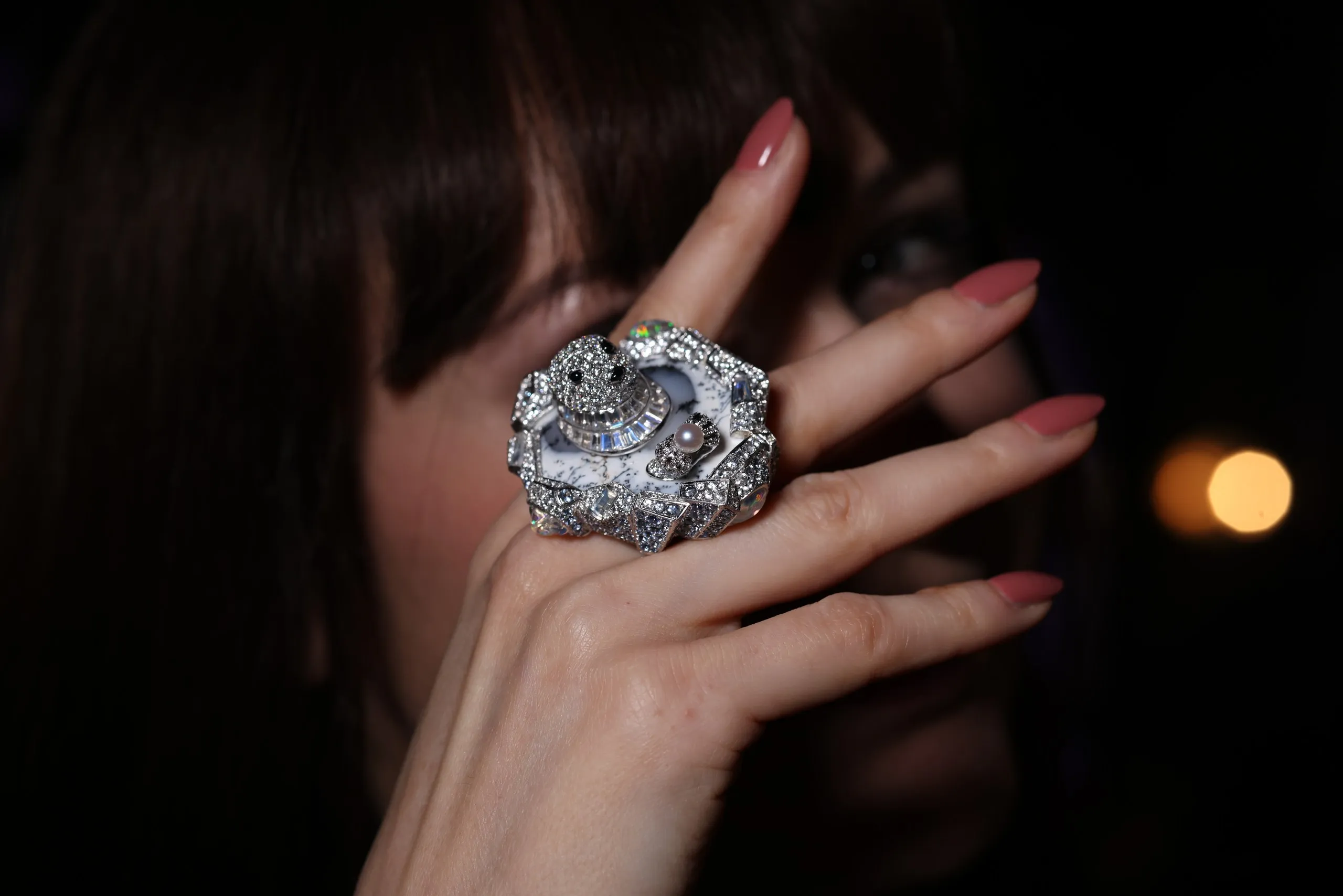 <p>A seal bobs on its back in dendritic opal waters in this White Paradise high jewellery ring</p>
