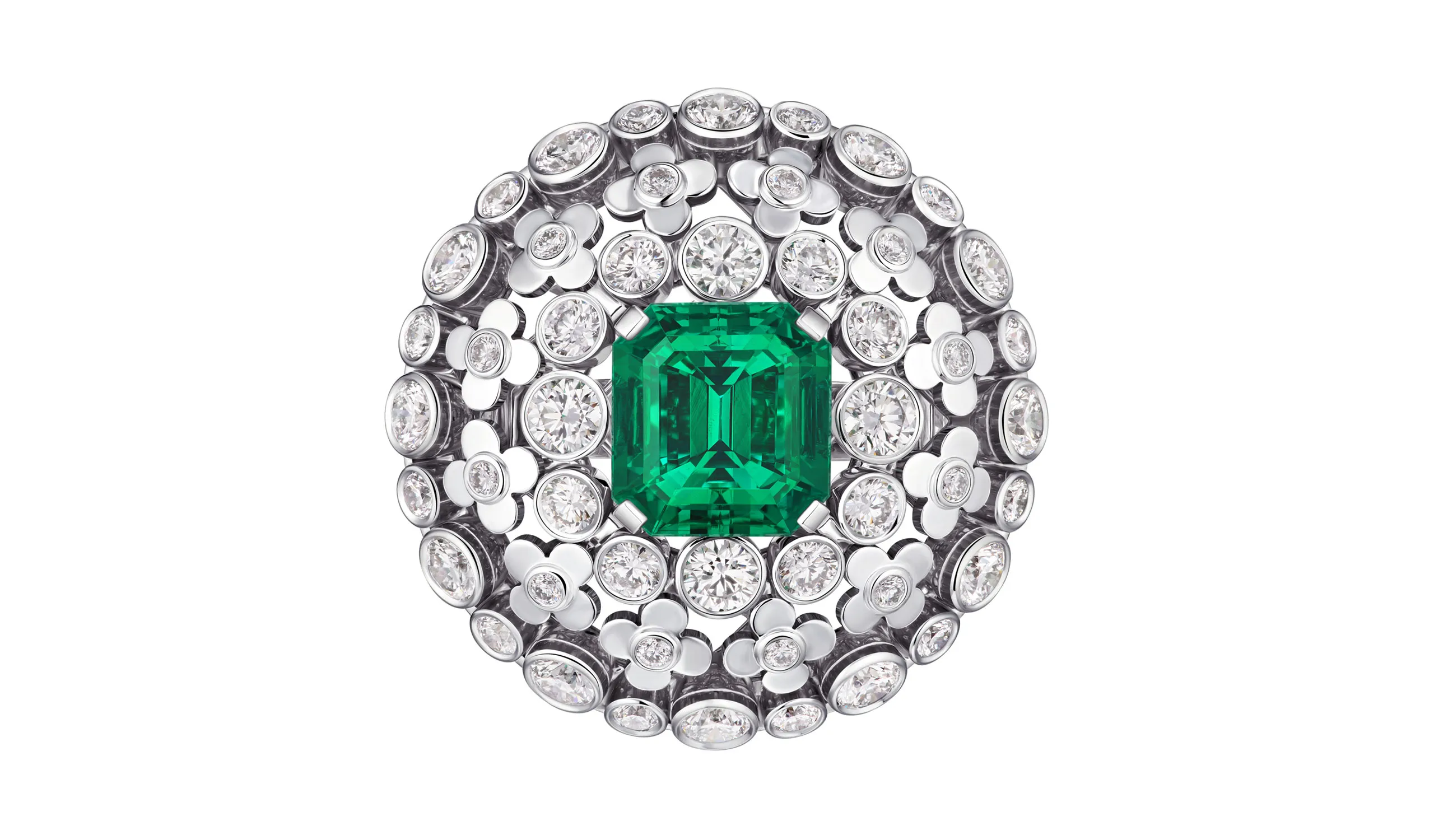 <p>A third Mesmerism emerald and diamond jewellery ring, featuring the same medallion-style design as the pendant</p>
