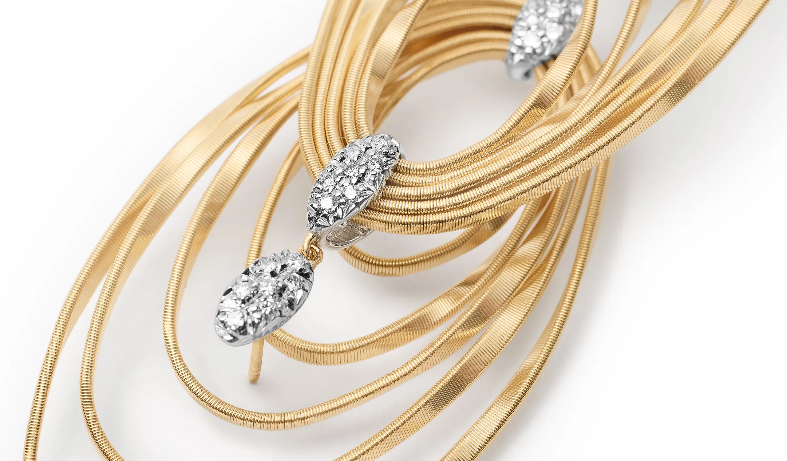 <p>Marco Bicego 18k yellow gold chandelier earrings from the Marrakech Onde collection, with twisted coils and pavé diamonds</p>