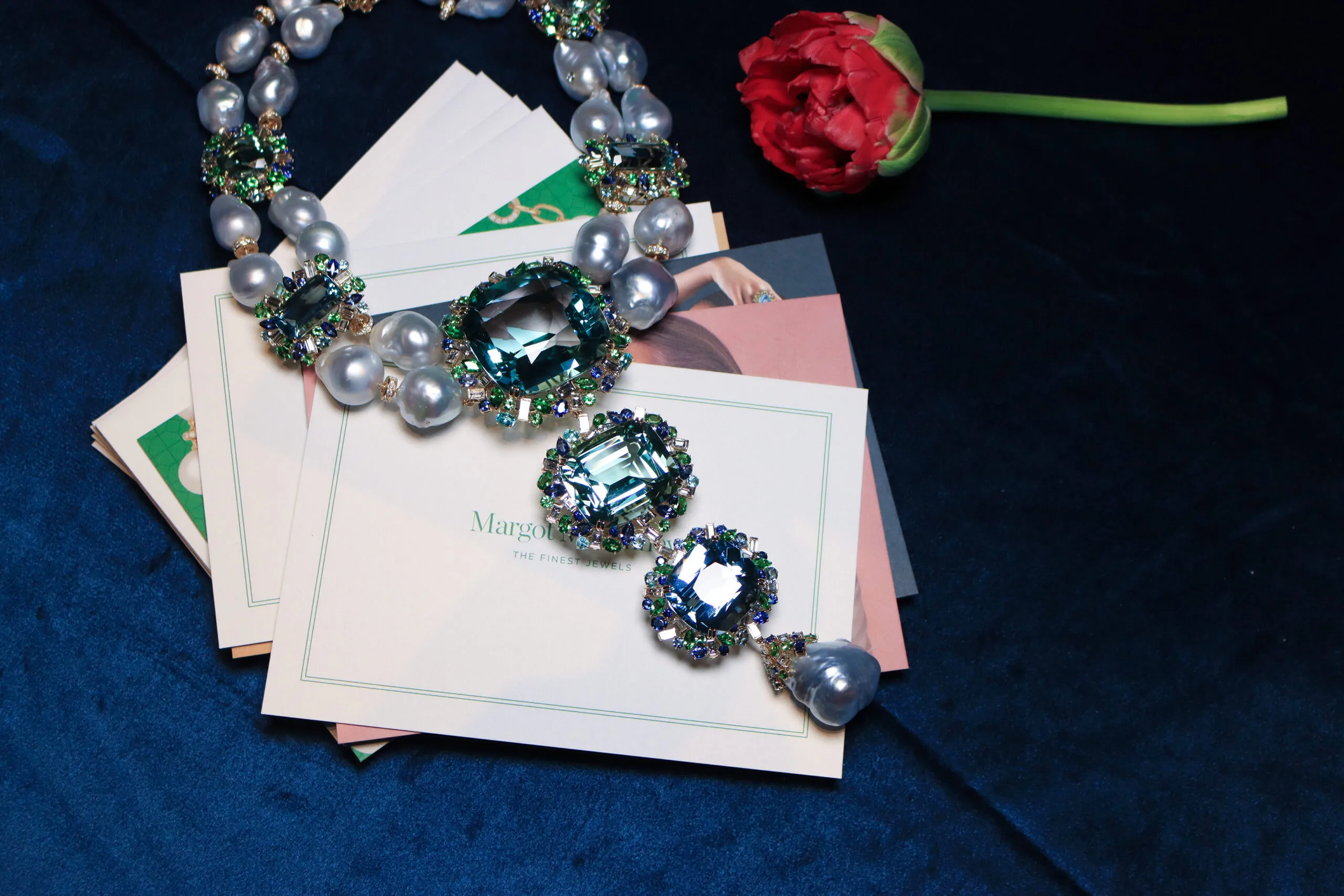 <p>Margot McKinney Marina collier with an extraordinary suite of gemstones including two large green beryls (241.14ct and109.48ct) and an aquamarine (65.72ct) at its heart, along with 25 large Australian South Sea baroque pearls. The 24 pearls in the collier’s double strands measure17-22mm, while a single, particularly rare example measuring 26x30mm is placed as the focal point beneath the hero aquamarine. The piece is completed with two aquamarines (32.44ct), two green tourmalines (15.88ct and 24.09ct), and a green beryl (22.47ct) along with diamonds, sapphires, green tourmalines, Paraiba tourmalines, aquamarines and tsavorites, set in 18k yellow gold</p>
