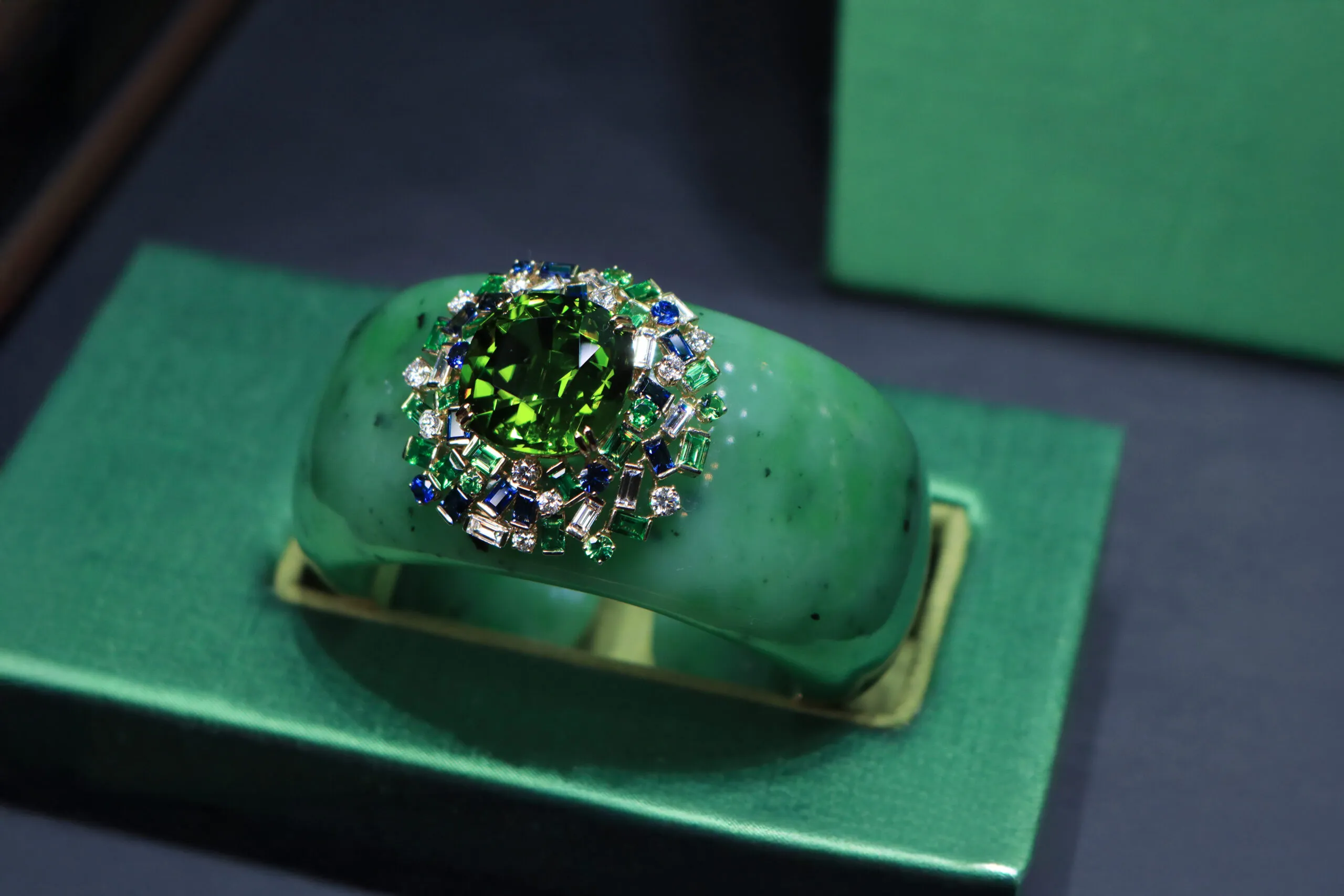 <p>Margot McKinney Coral Cay cuff with a 40.82 carat peridot, 1,096.65 carats of nephrite, diamonds, tsavorites, and blue sapphires set in 18k yellow gold</p>
