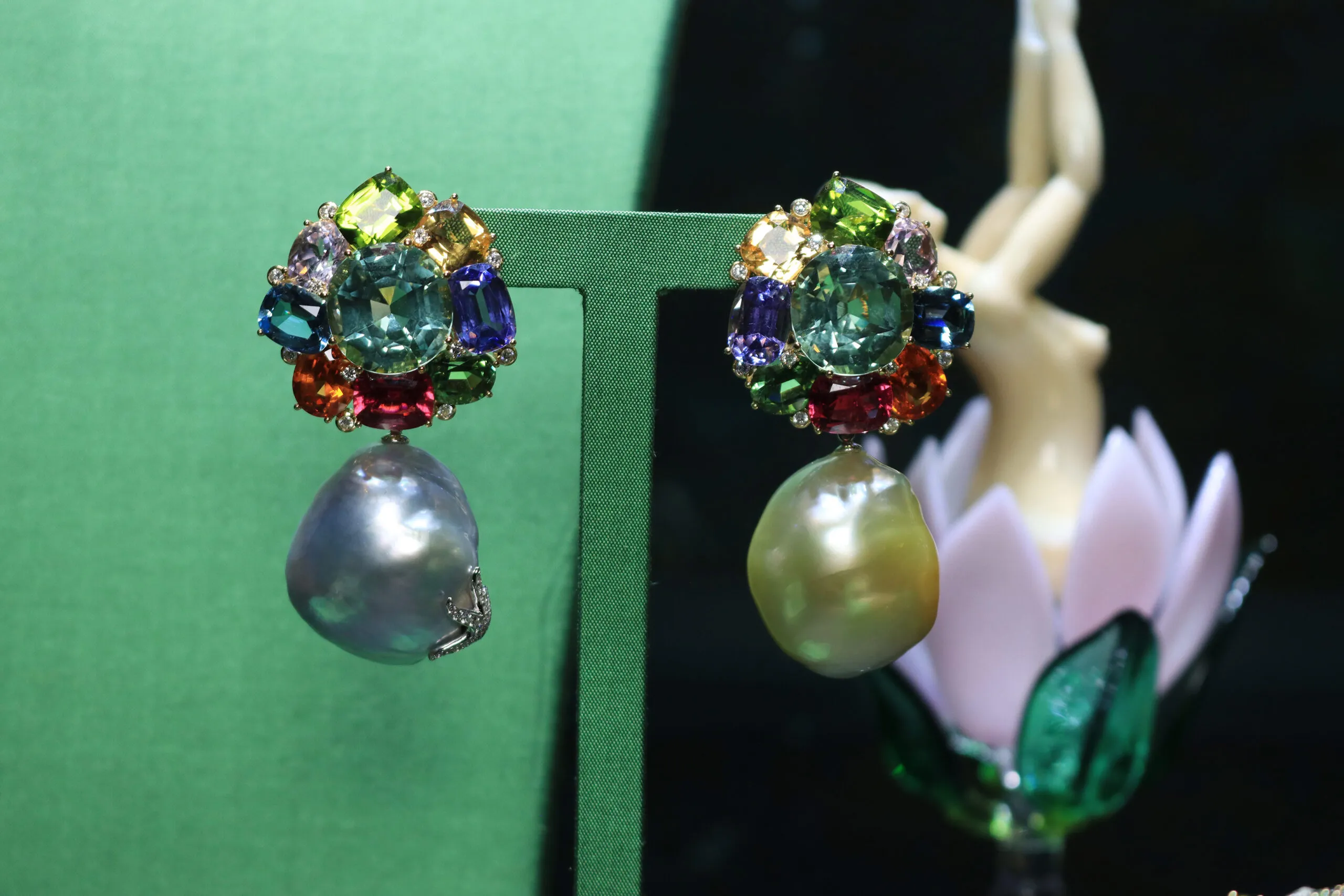 <p>Margot McKinney Lorikeet earrings with 40.84 carats of green tourmalines, Australian South Sea baroque pearls, peridots, kunzites, yellow beryls, aquamarines, tanzanites, mandarin garnets, green tourmalines, rubellites and diamonds, set in 18k yellow and white gold </p>

