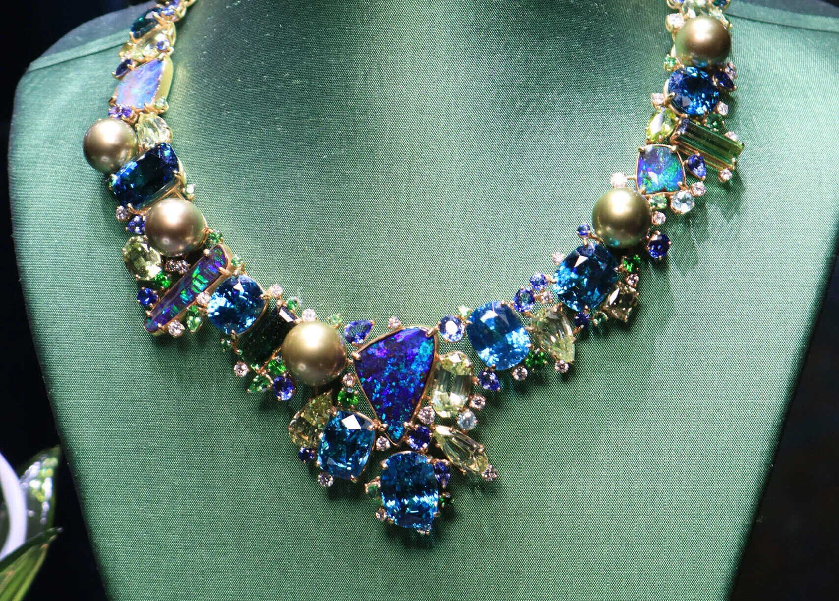 <p>Margot McKinney Cascade collier with 38.35 carats of Australian boulder opals, pistachio pearls, diamonds, blue zircons, yellow beryls, Paraiba tourmalines, demantoids, green tourmalines, blue sapphires, tanzanites, tsavorites and peridots, set in 18k yellow gold </p>
