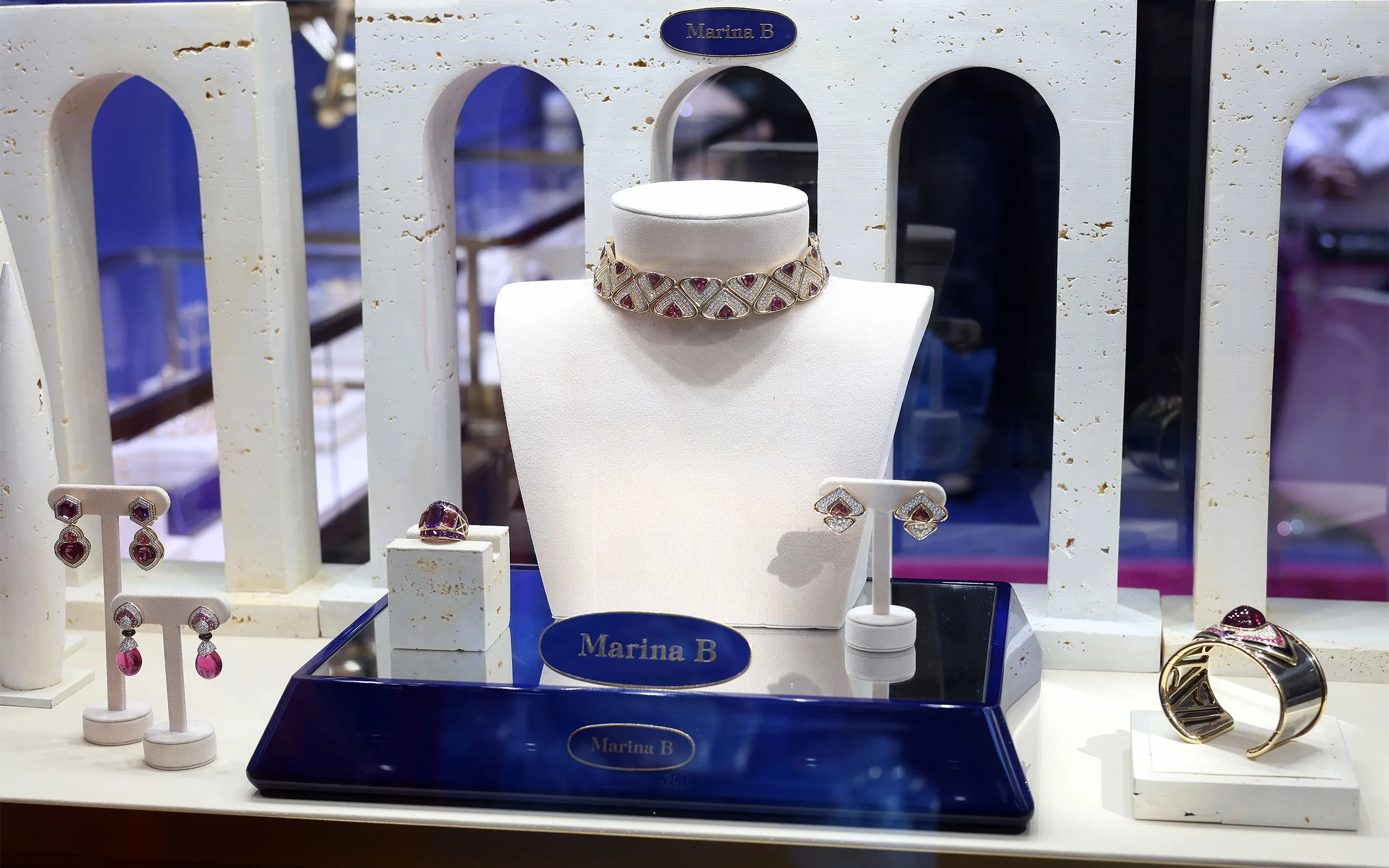 <p>The vitrines in the New York boutique are a mix of rich 18k yellow gold, strong silhouettes, precise geometry and cabochon stones in the saturated hues Marina B loved</p>
