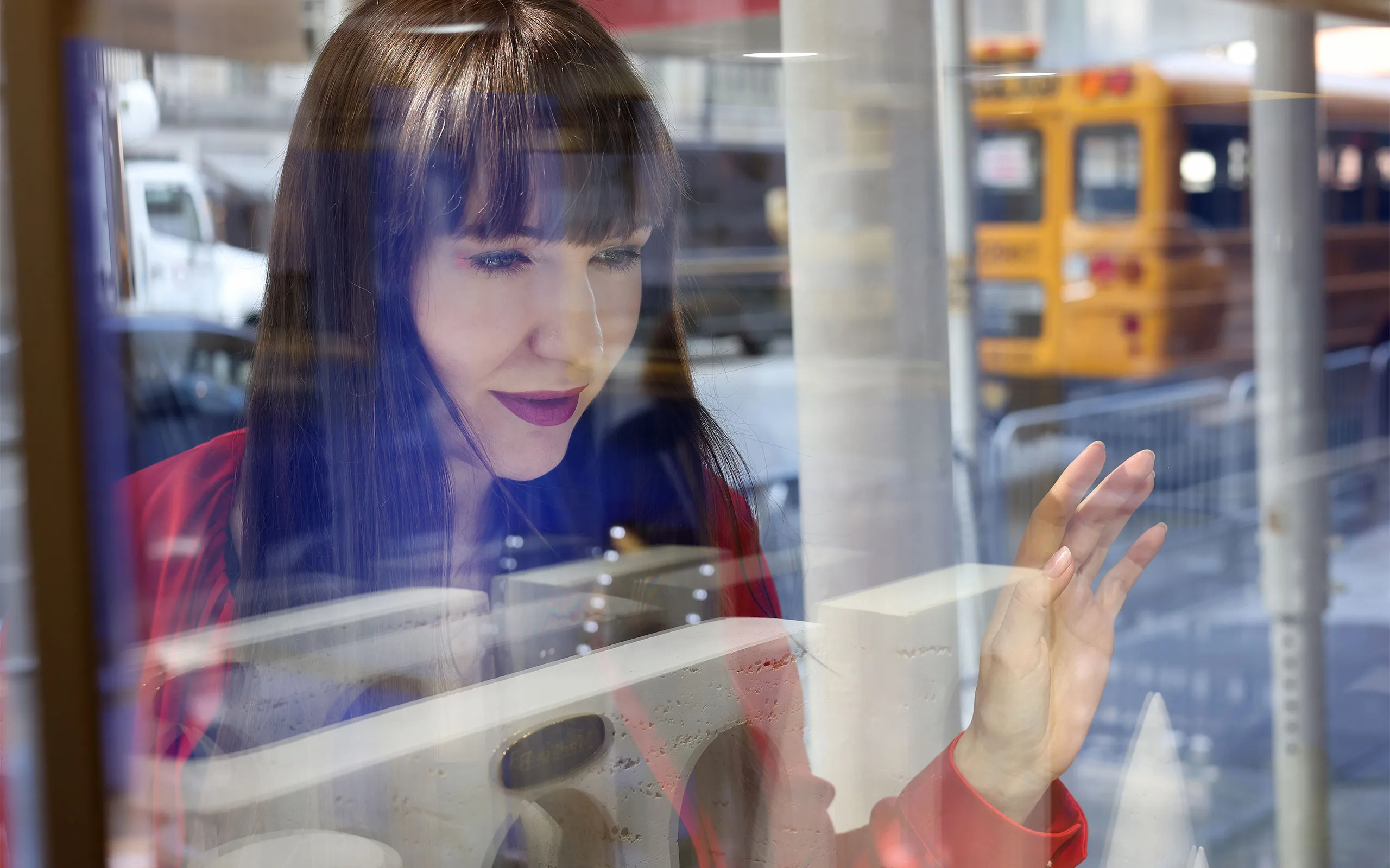 <p>Katerina looks into the window of the Marina B boutique on the corner of 673 Madison Avenue</p>
