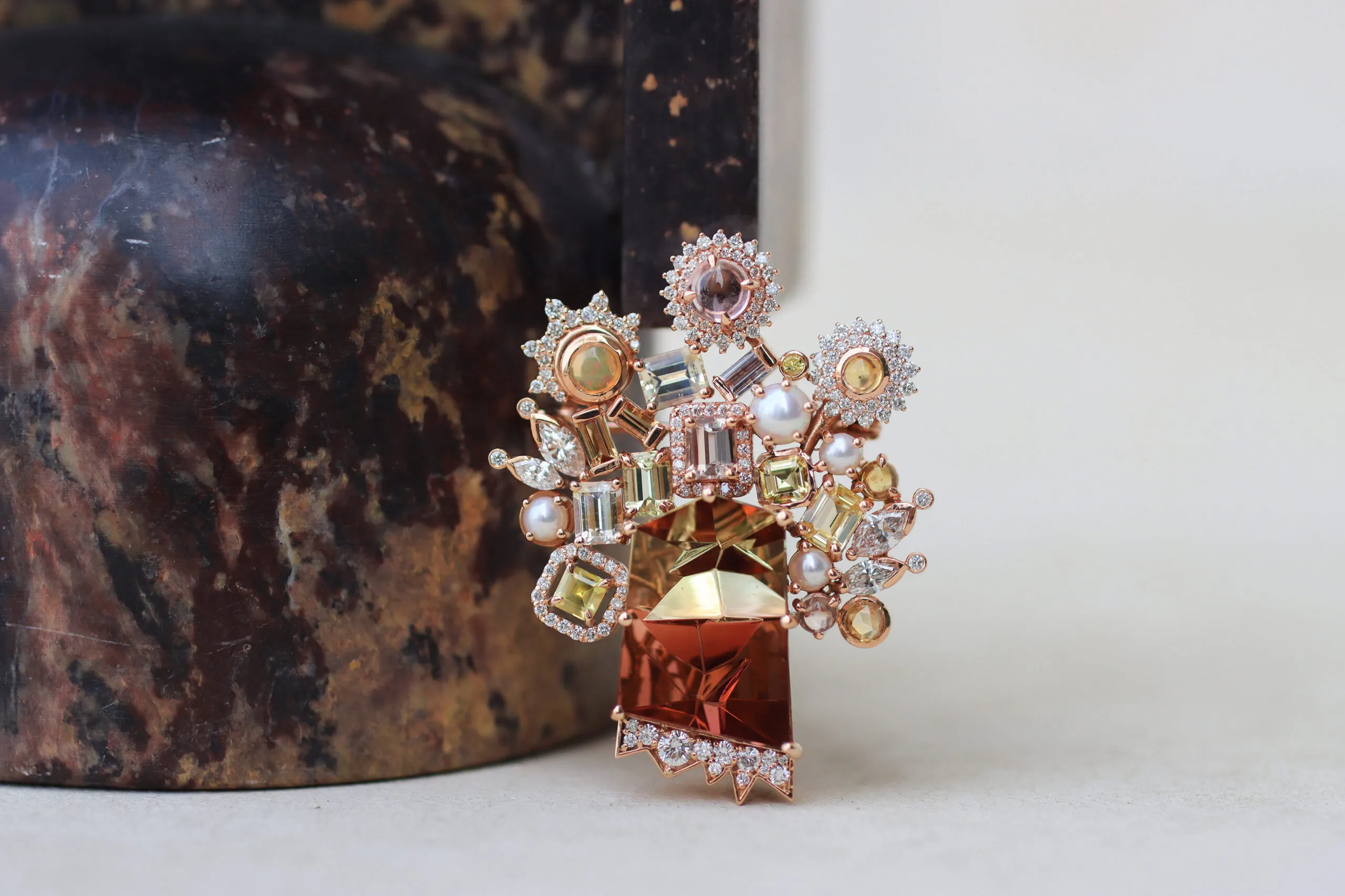 <p>Mariyeh Ghelichkhani Tree of Life brooch-pendant with a 13-carat tourmaline, pastel-coloured sapphires, diamonds and pearls set in 18k rose gold </p>
