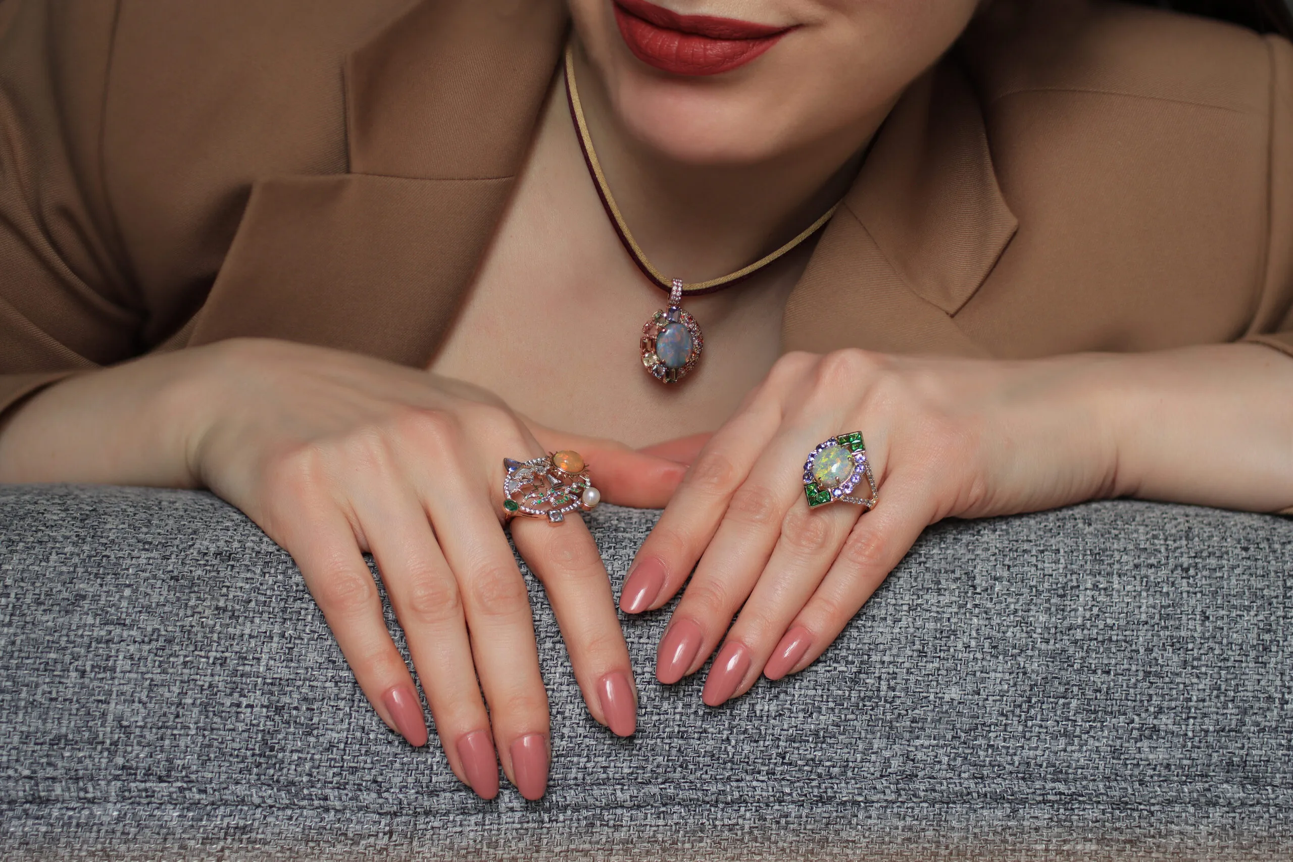 <p>Katerina Perez wears pieces by Mariyeh Ghelichkhani, including the Twilight Splendour pendant, the Serene Voyage ring (left) and the Angels Fall ring</p>
