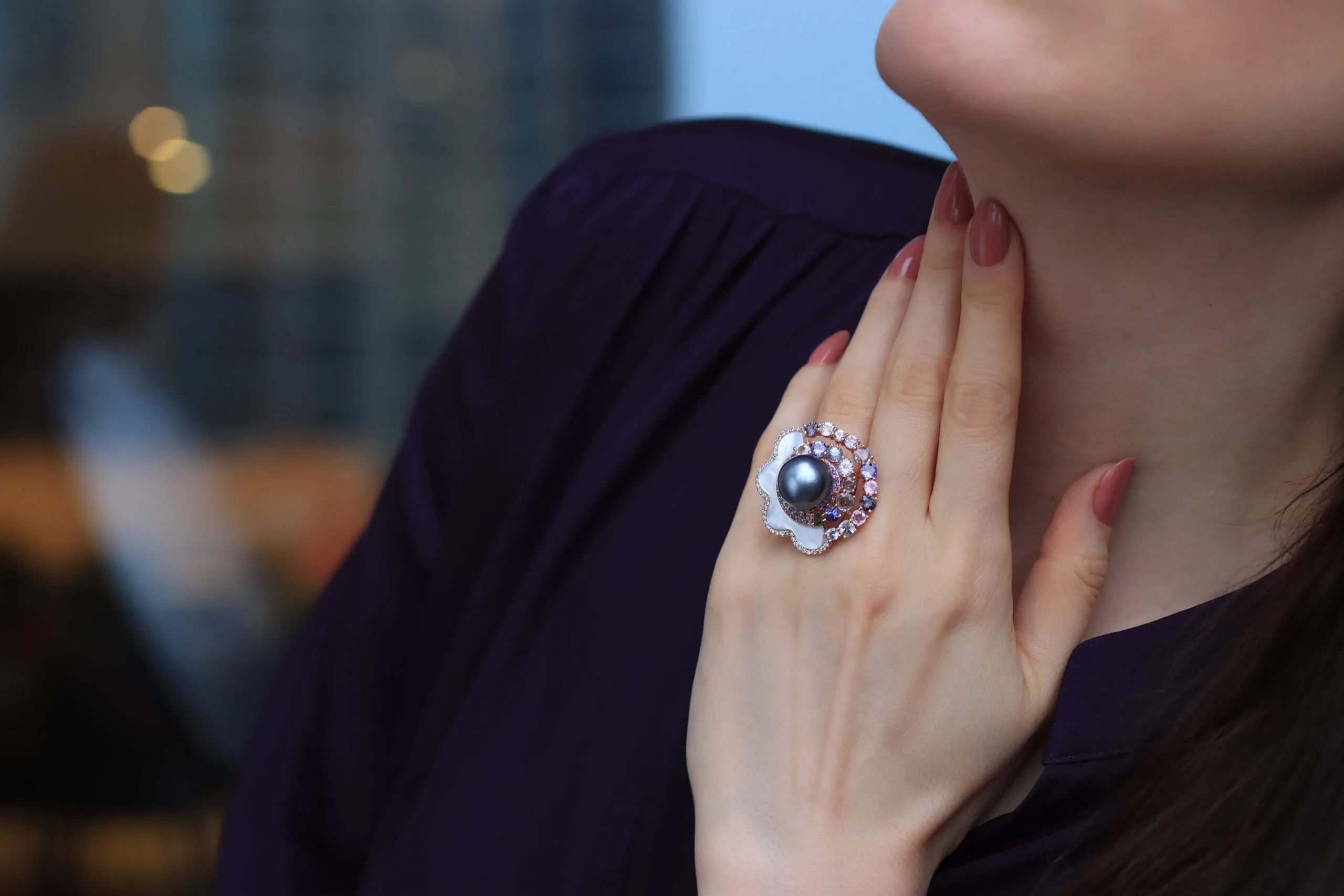 <p>Katerina Perez wears the Mariyeh Ghelichkhani Passing Cloud ring with a Tahitian pearl, mother of pearl, diamonds and pastel-coloured sapphires set in 18k yellow gold </p>
