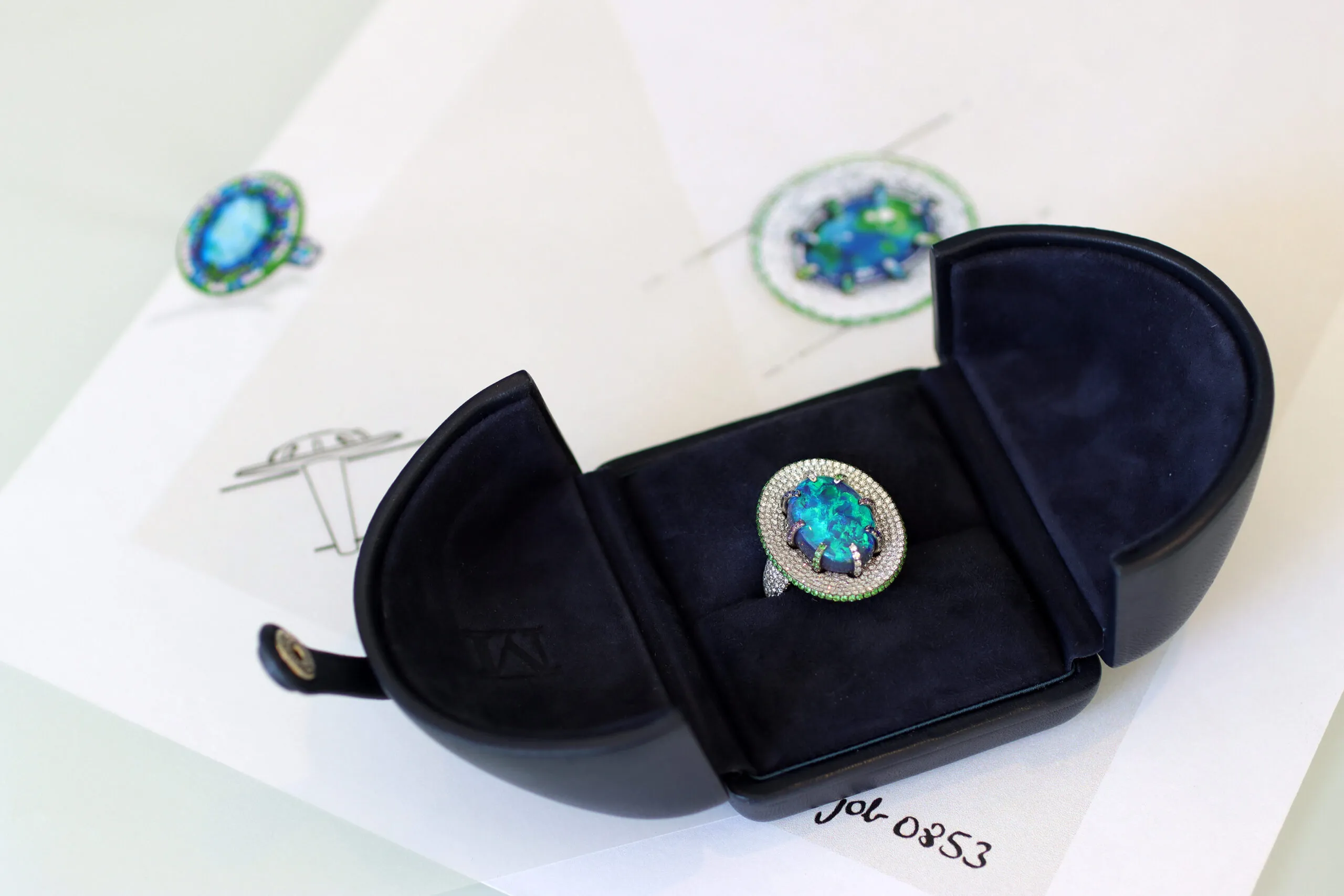 <p>A closer look at a Martin Katz right-hand ring with a 10.50-carat black opal, micro-set with 580 diamonds, sapphires, amethysts and tsavorites </p>
