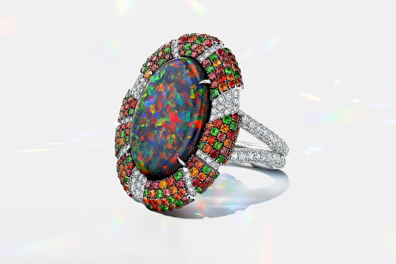 <p>Martin Katz ring with a 6.80-carat oval-shaped Australian black opal, 257 micro-set diamonds, 187 sapphires and 66 tsavorite garnets, set in platinum ©martinkatzjewels</p>
