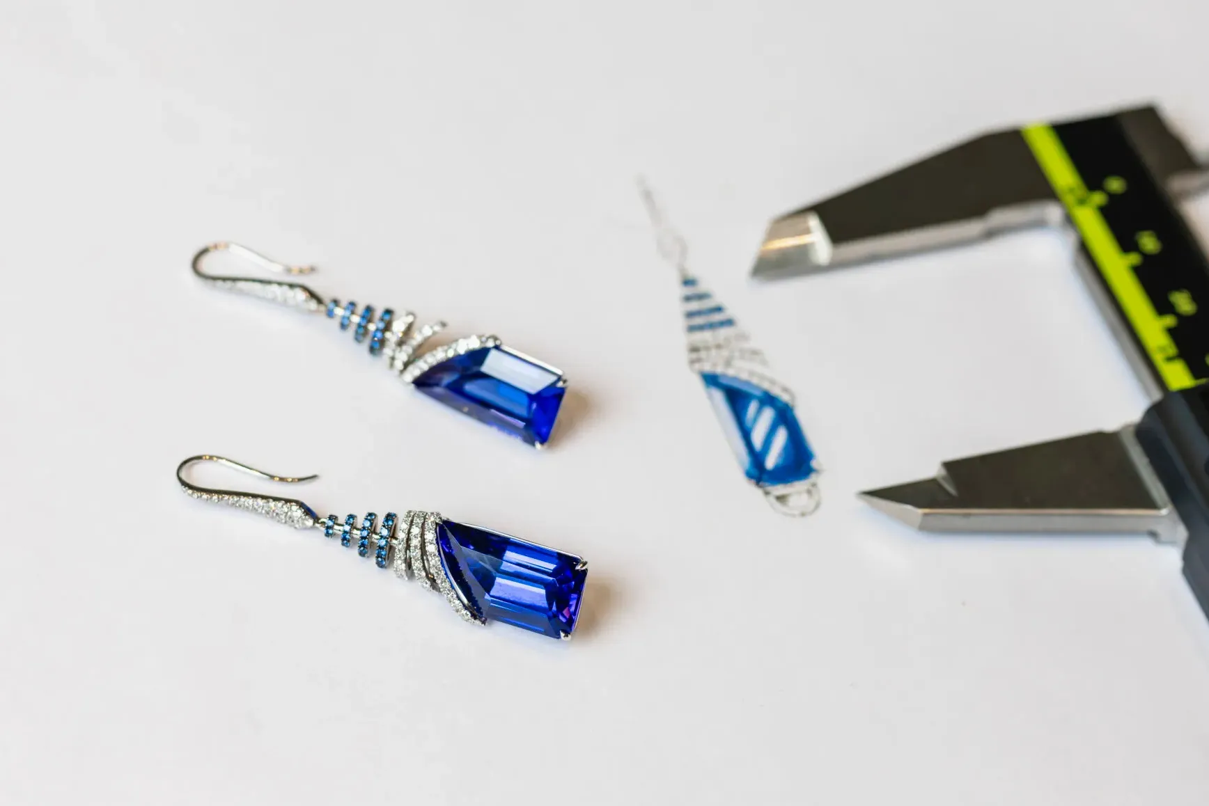 <p>Martin Katz Tanzanite Drop earrings with 17.25 carats of tanzanites surrounded by 116 diamonds and 84 sapphires set in 18k white gold ©martinkatzjewels</p>
