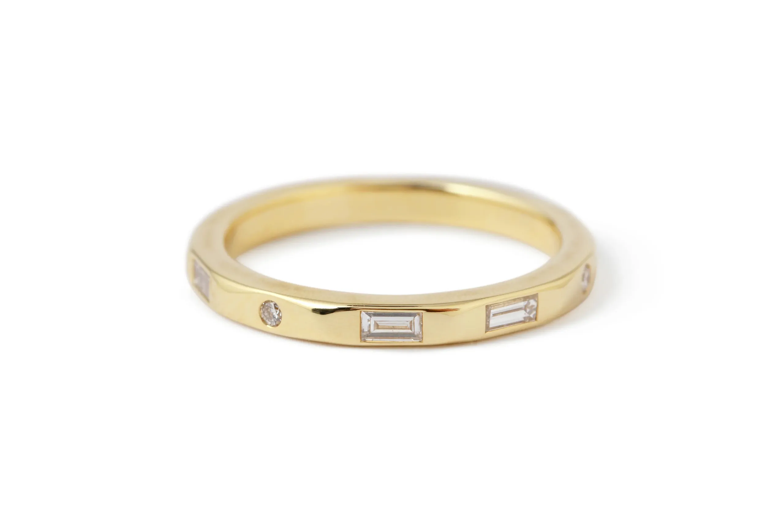 <p>Send a secret message with Melissa Joy Manning’s Morse Code I Love You diamond band in 18K yellow gold.</p>