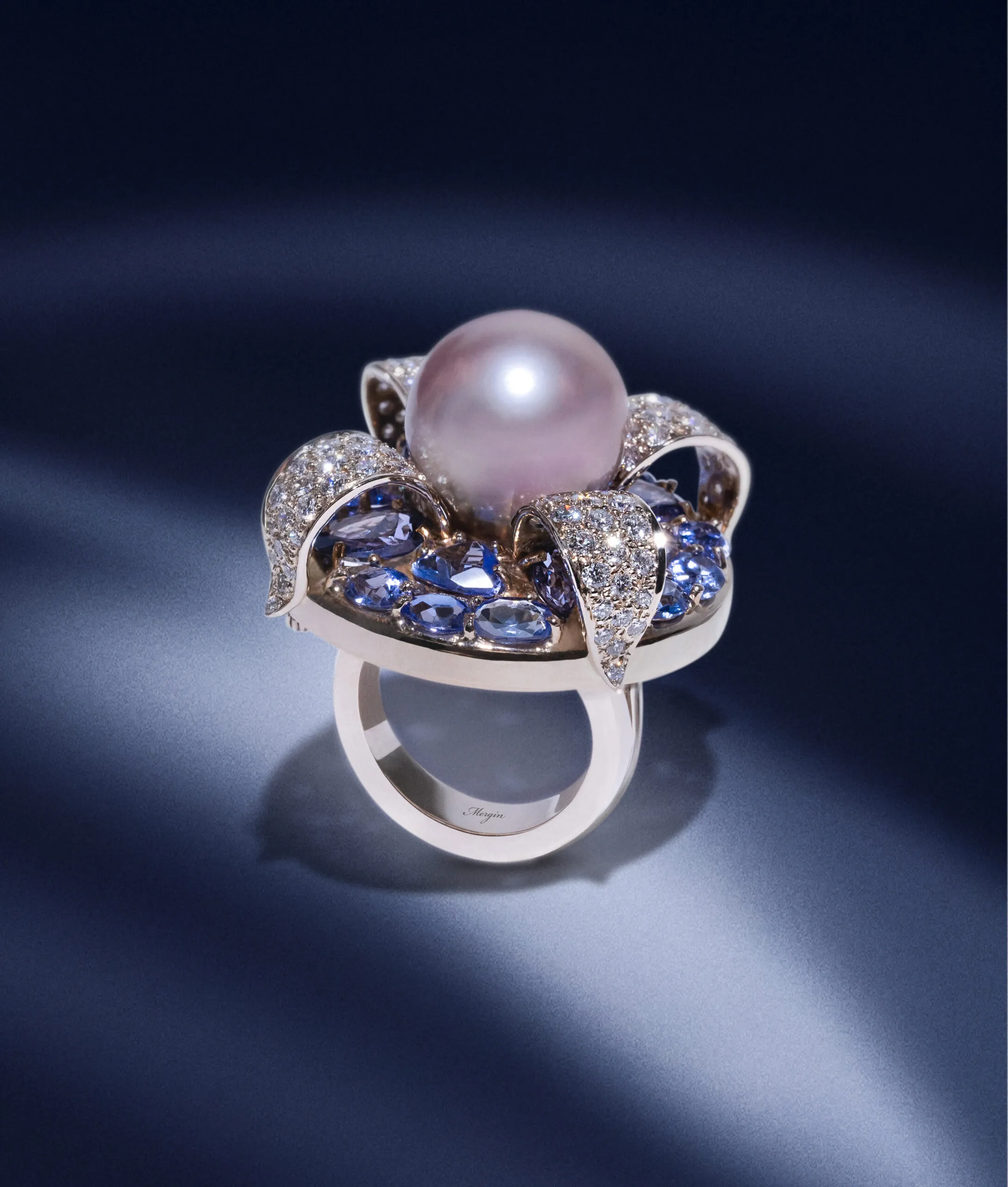 <p>Mergin Jewelry by Mehragin Rahmati ring with a 17mm South Sea pearl, diamonds and tanzanite</p>
