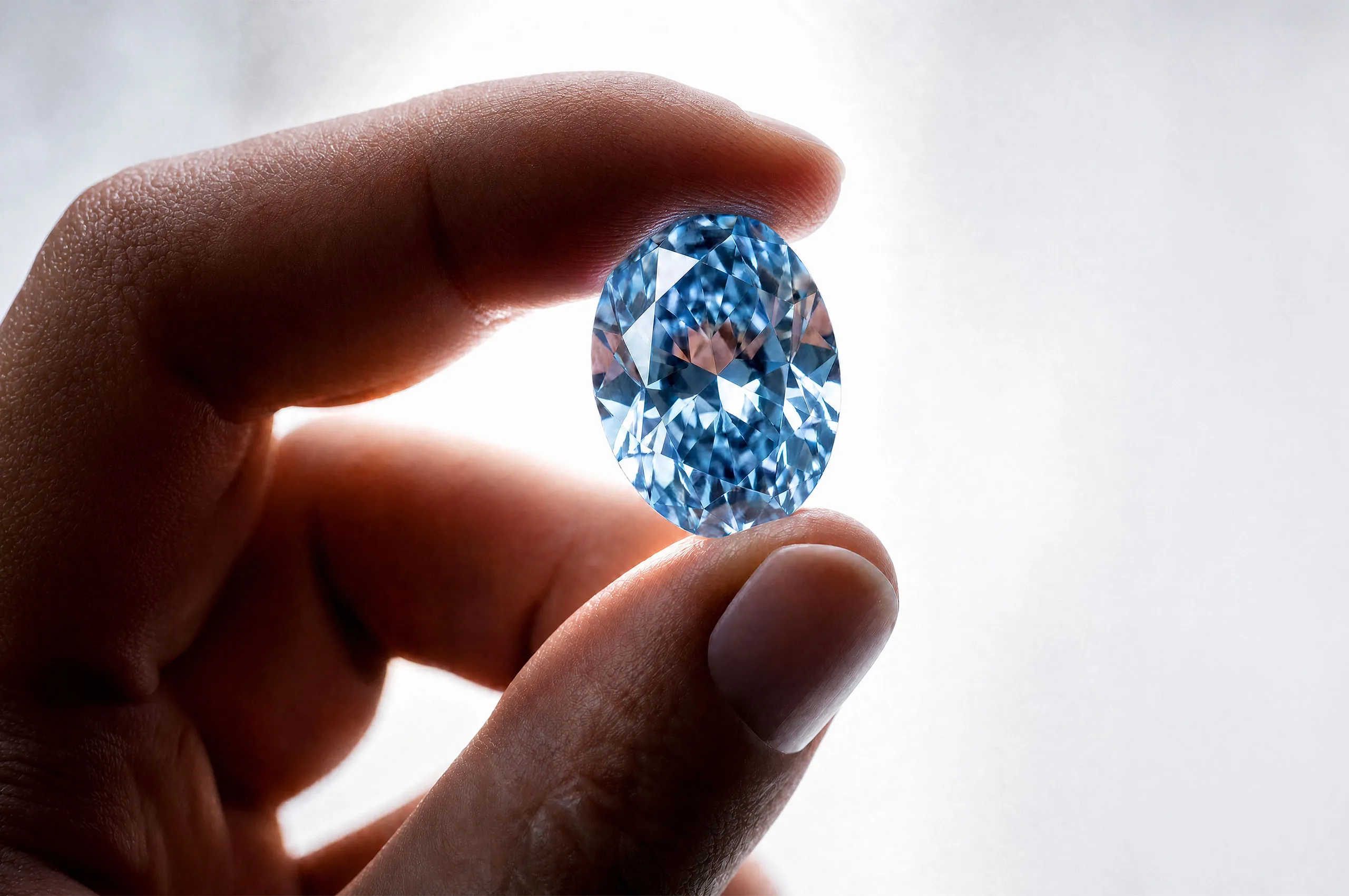 Looking through the 20.46-carat Fancy Deep Blue diamond Okavango Blue diamond