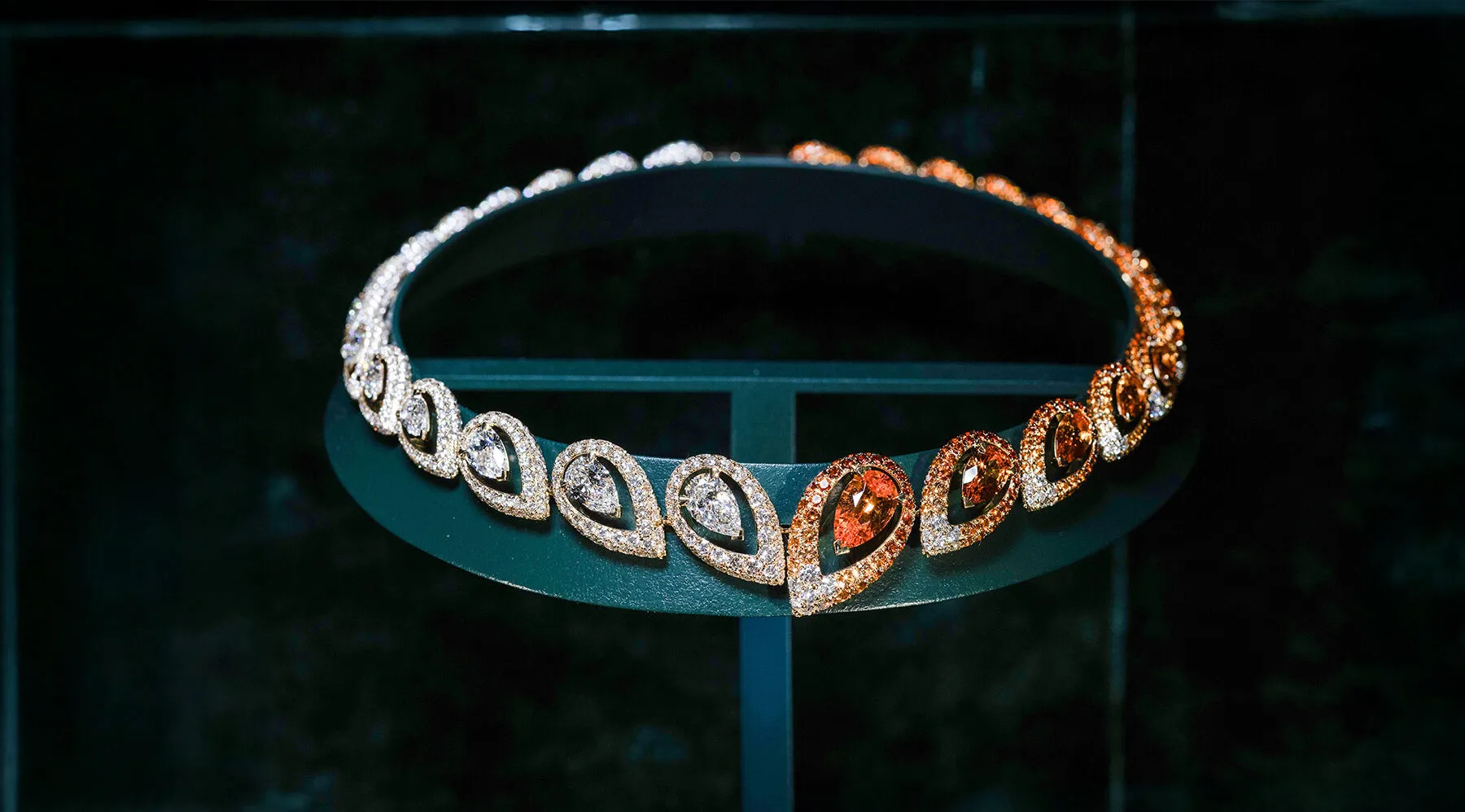 <p>Messika Hypnotic necklace with spessartite garnets and white diamonds in 18k yellow gold from the Terres d’Instinct High Jewellery collection</p>