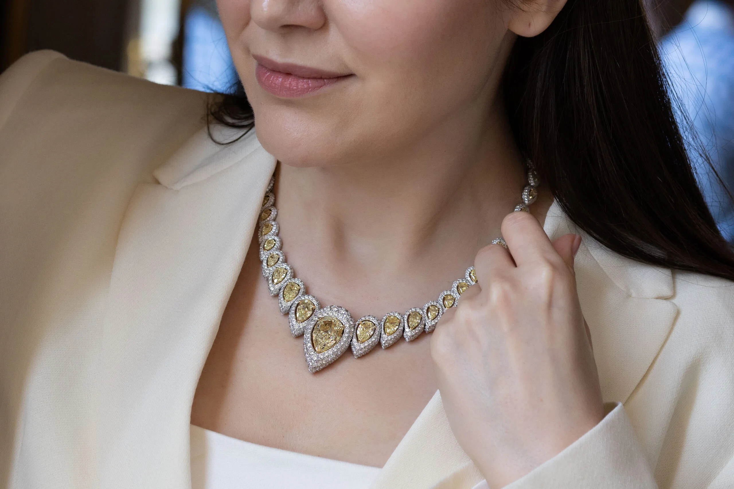 <p>Katerina Perez wears the Messika Incandescence necklace with a fancy yellow pear-shaped diamond of 20.04 carats, surrounded by 37 yellow diamonds and white diamonds in 18k white gold, from the Terres d’Instinct High Jewellery collection</p>