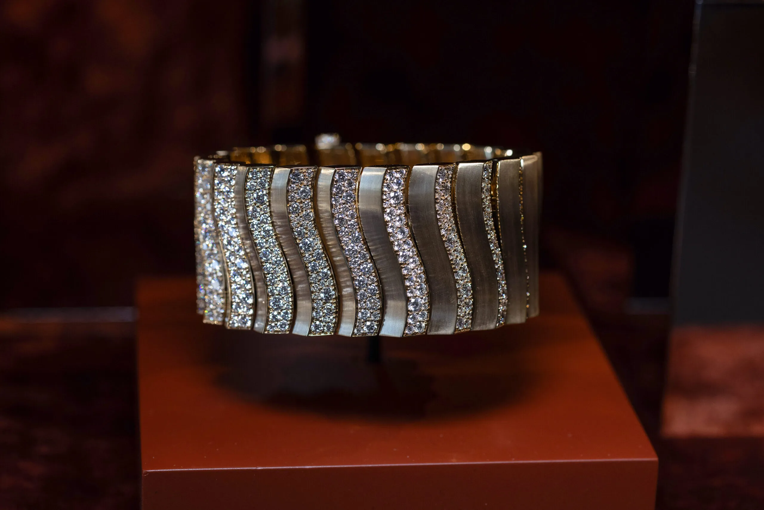 <p>Messika Mirage cuff bracelet with white diamonds in 18k brushed yellow gold from the Terres d’Instinct High Jewellery collection</p>