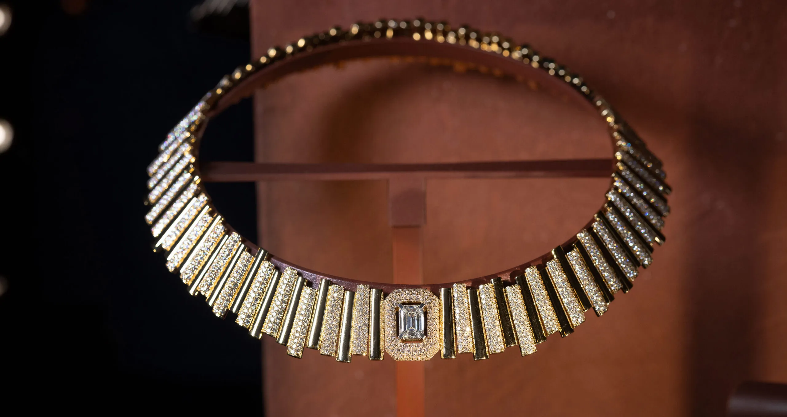 <p>Messika Roc necklace with an emerald-cut diamond of 2.0 carats alongside further diamonds in 18k yellow gold, part of the Terres d’Instinct High Jewellery collection</p>