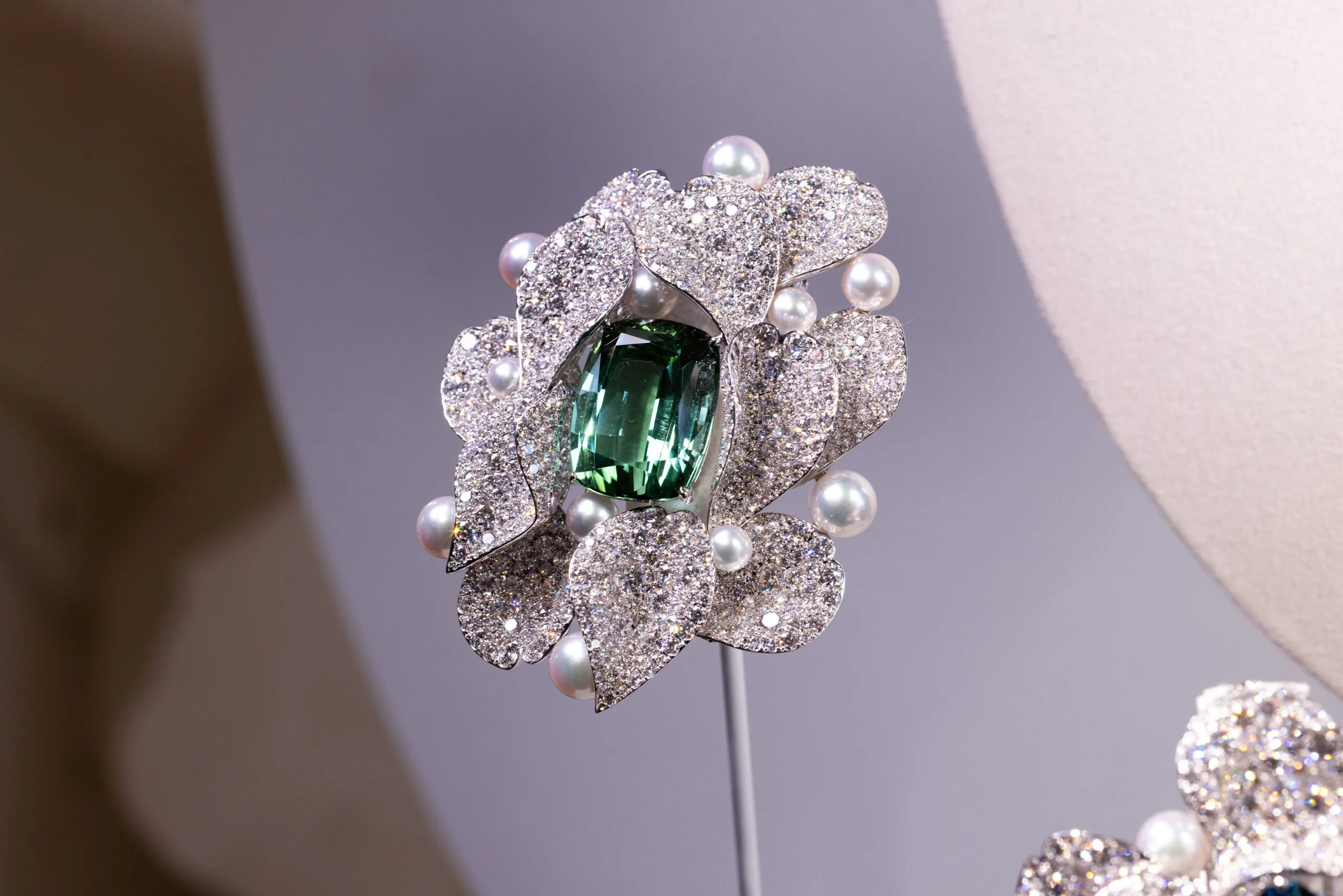 <p>An Akoya cultured pearl brooch with a 28.79-carat tourmaline and 22.71 carats of diamonds set in 18k white gold, part of the Mikimoto Les Pétales High Jewellery collection</p>