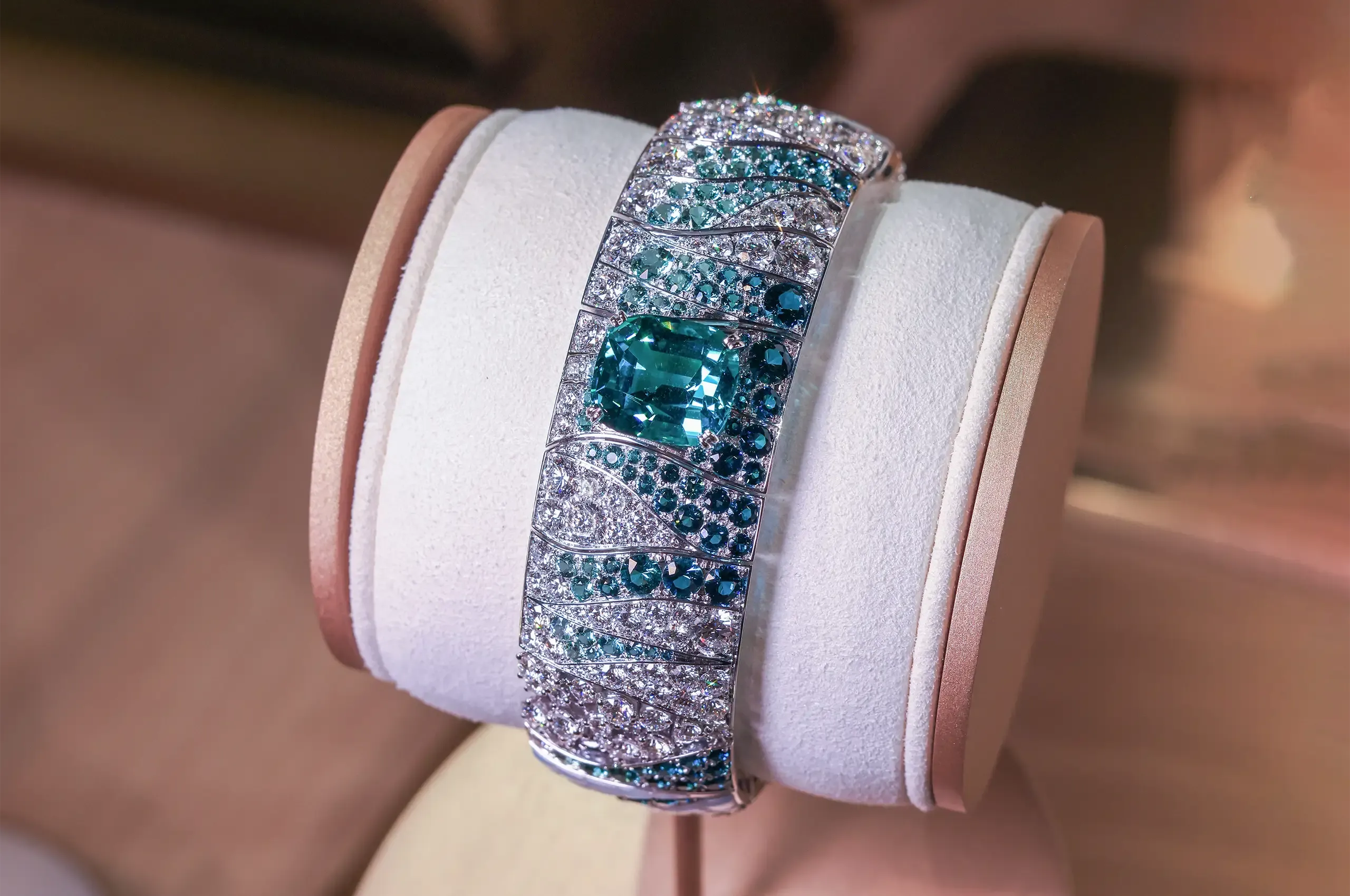 The Maison FRED Crystalline Joy bracelet features a gradient of blue-green tourmalines and diamonds