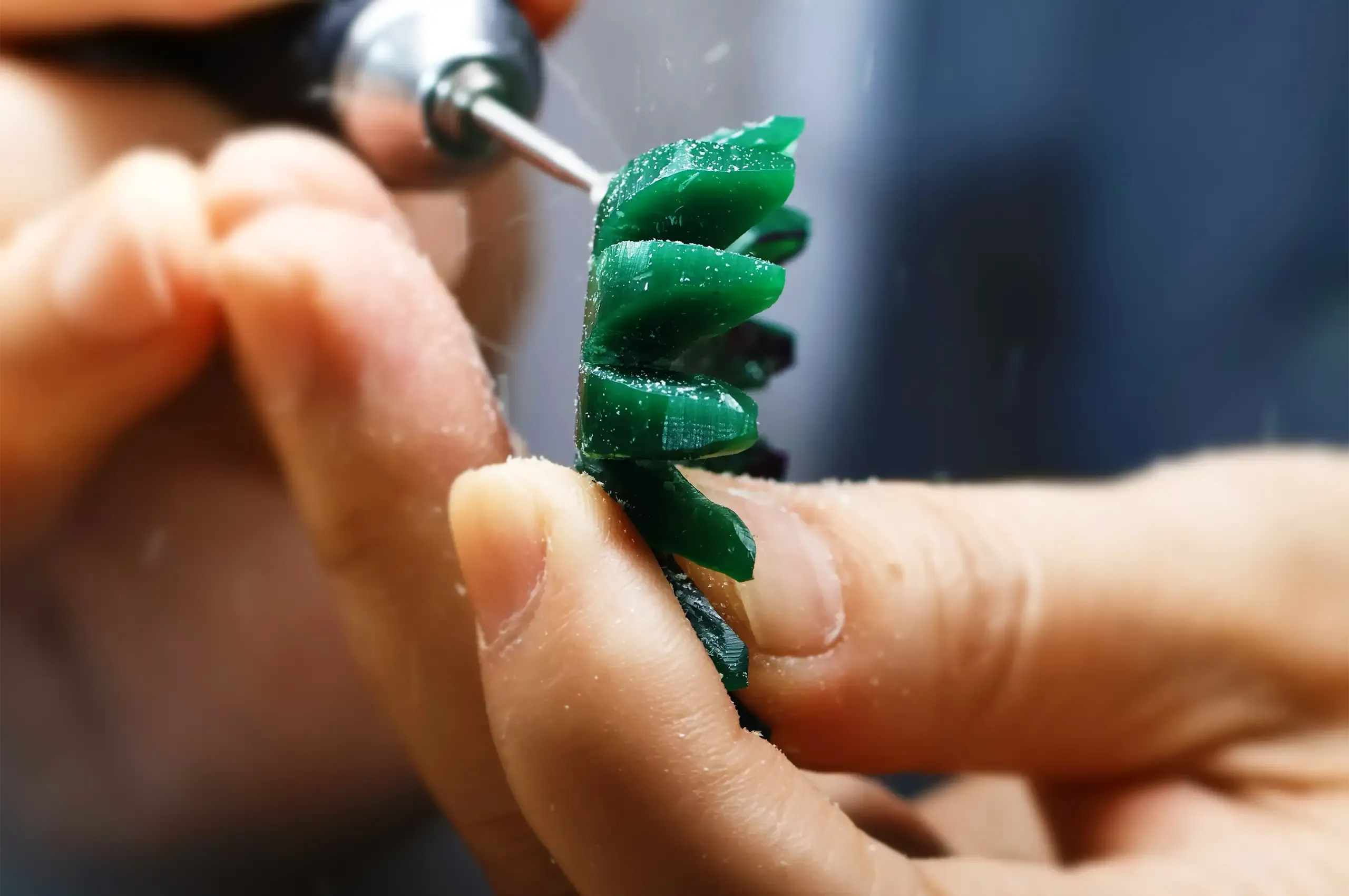 Carving a jewellery model in wax before casting