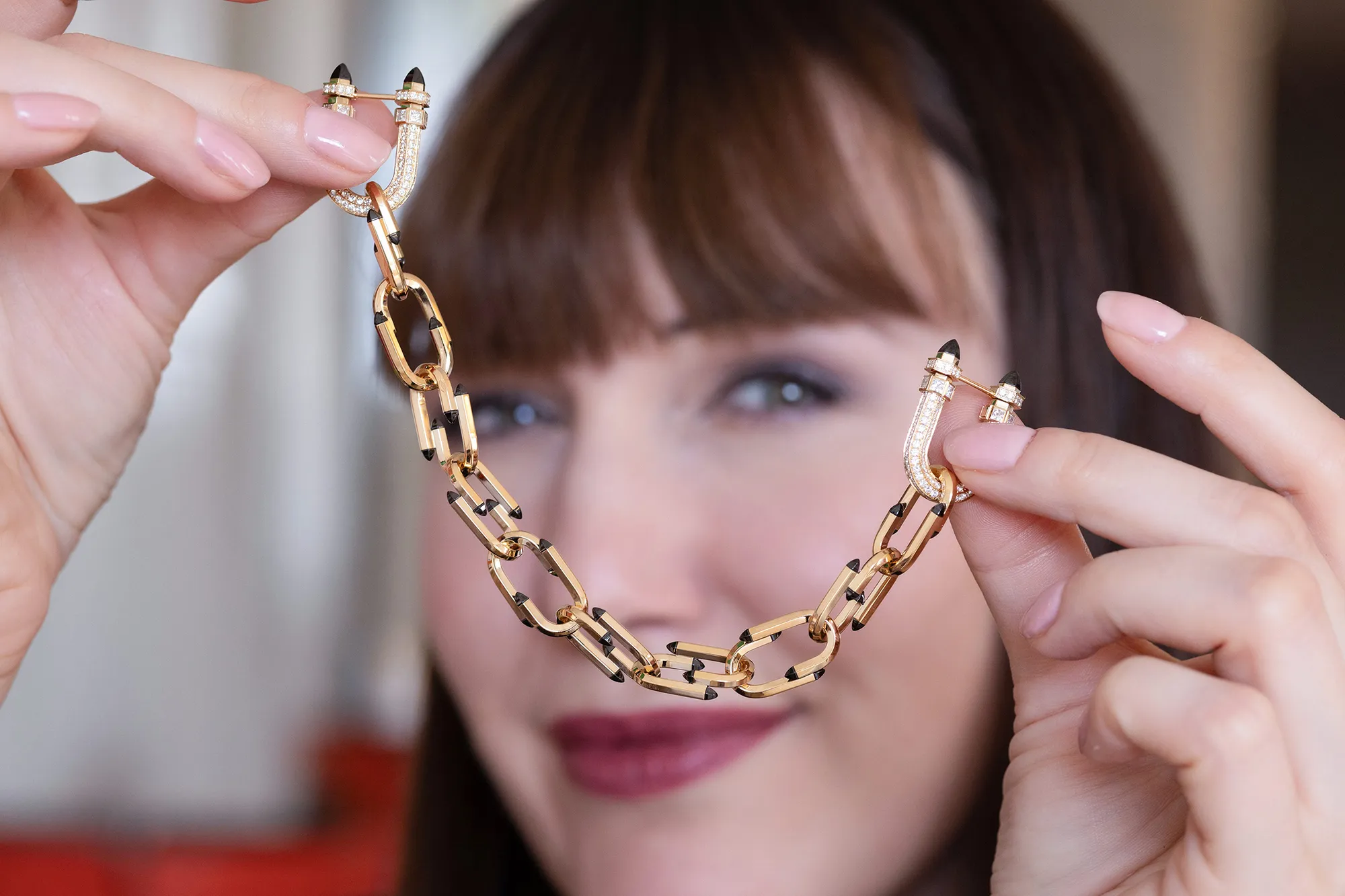 <p>Katerina Perez spotlights the Nouvel Héritage Try Me ‘Tuxedo’ – a modern-day tie chain or double brooch – with diamonds and black ceramic in 18k yellow gold </p>