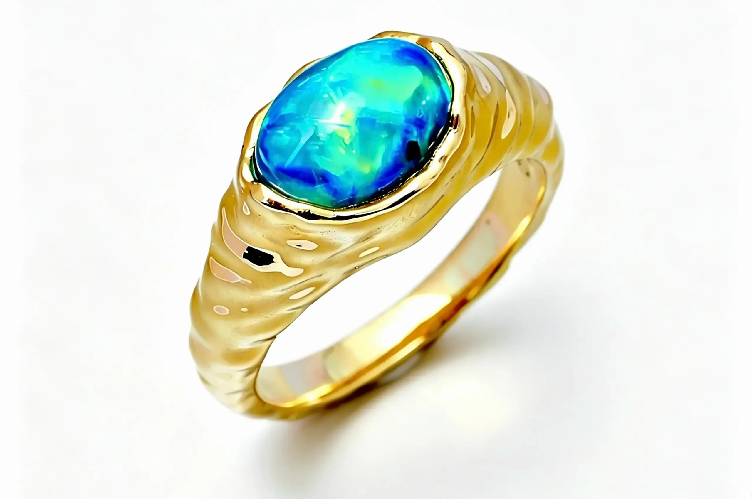 Olivia Chan Ocean Blue black opal ring with a 1.80 carat Australian black opal bezel-set in textured 18k yellow gold 