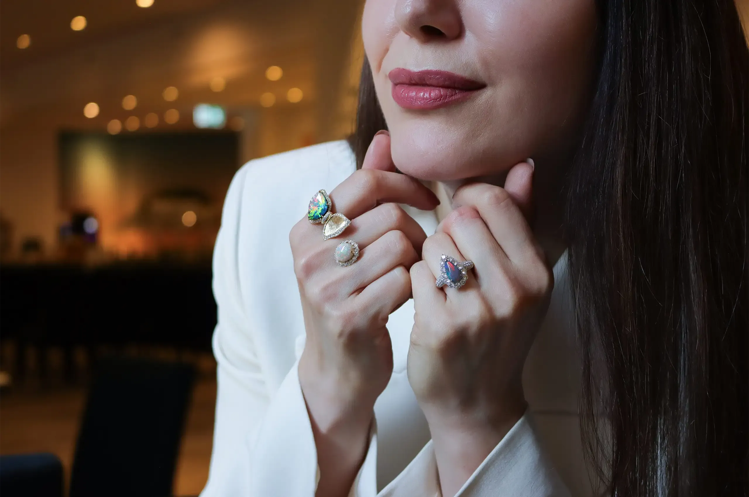 Olivia Chan brings together different Australian opals in her one-of-a-kind rings, including a playful two-finger butterfly design