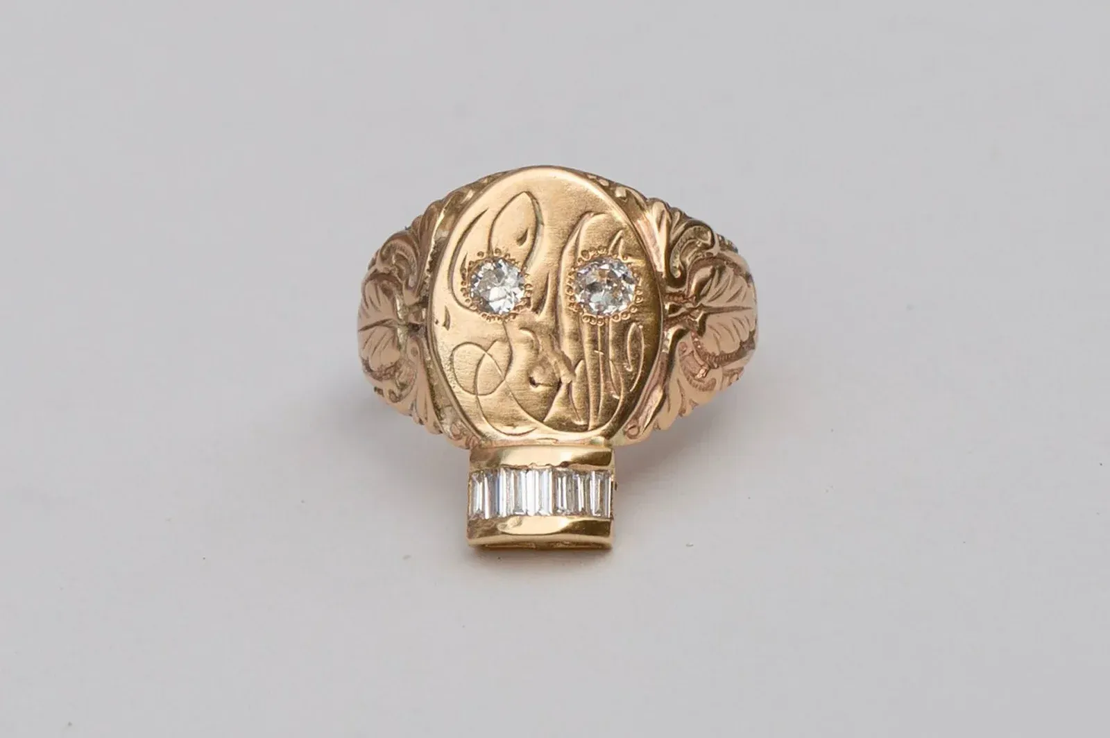 Oxbow Designs Old Soul signet ring in 14K yellow gold set with reclaimed and repurposed diamonds