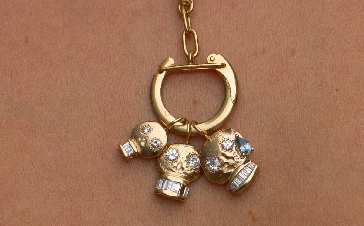 Oxbow Designs Old Soul pendants in 14K yellow gold set with reclaimed and repurposed diamonds