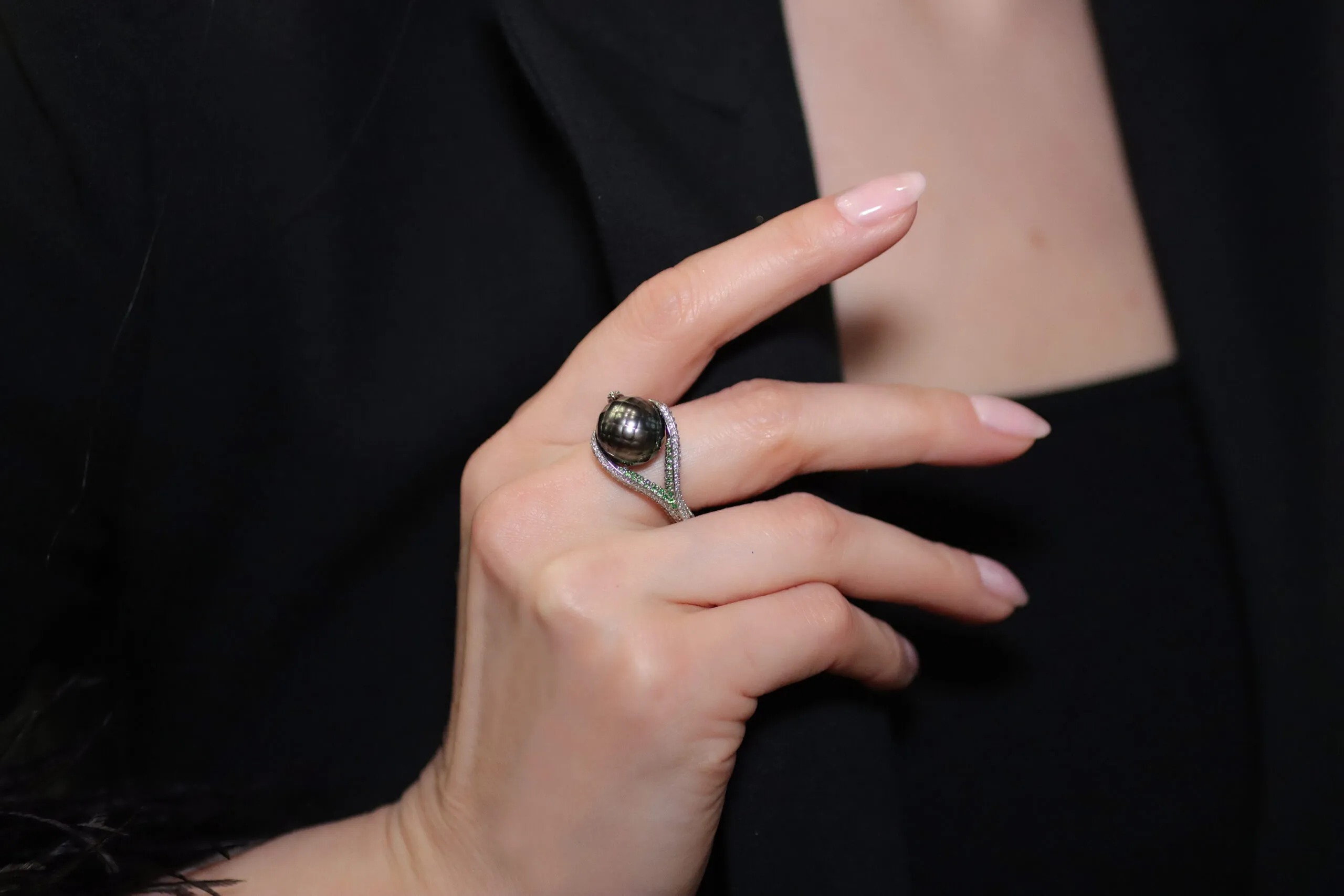 <p>Palm Beach Gems by Nicole Arcadia Tahitian pearl ring with a 12.9 mm hand-faceted pearl, white diamonds and green tsavorites, set in 14k white gold</p>