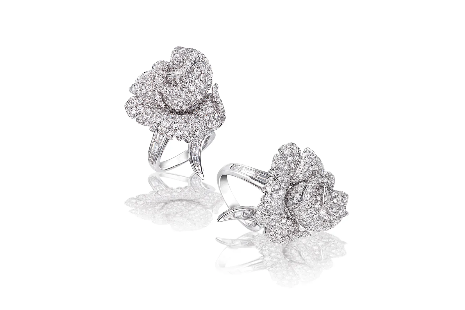 <p>A pair of Picchiotti Fine Jewellery Rose rings with baguette- and round brilliant-cut diamonds in 18k white gold </p>
