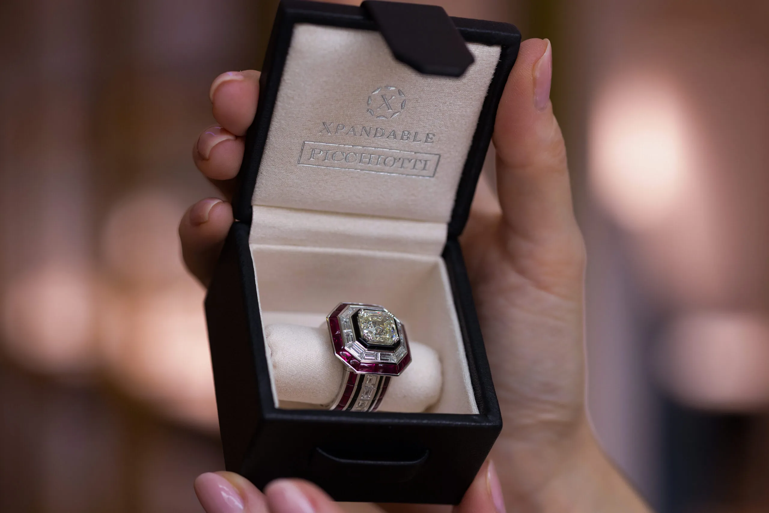 <p>The Xpandable construction completely changes how a cocktail ring of this size feels on the hand, removing much of the rigidity normally associated with such a substantial jewel</p>
