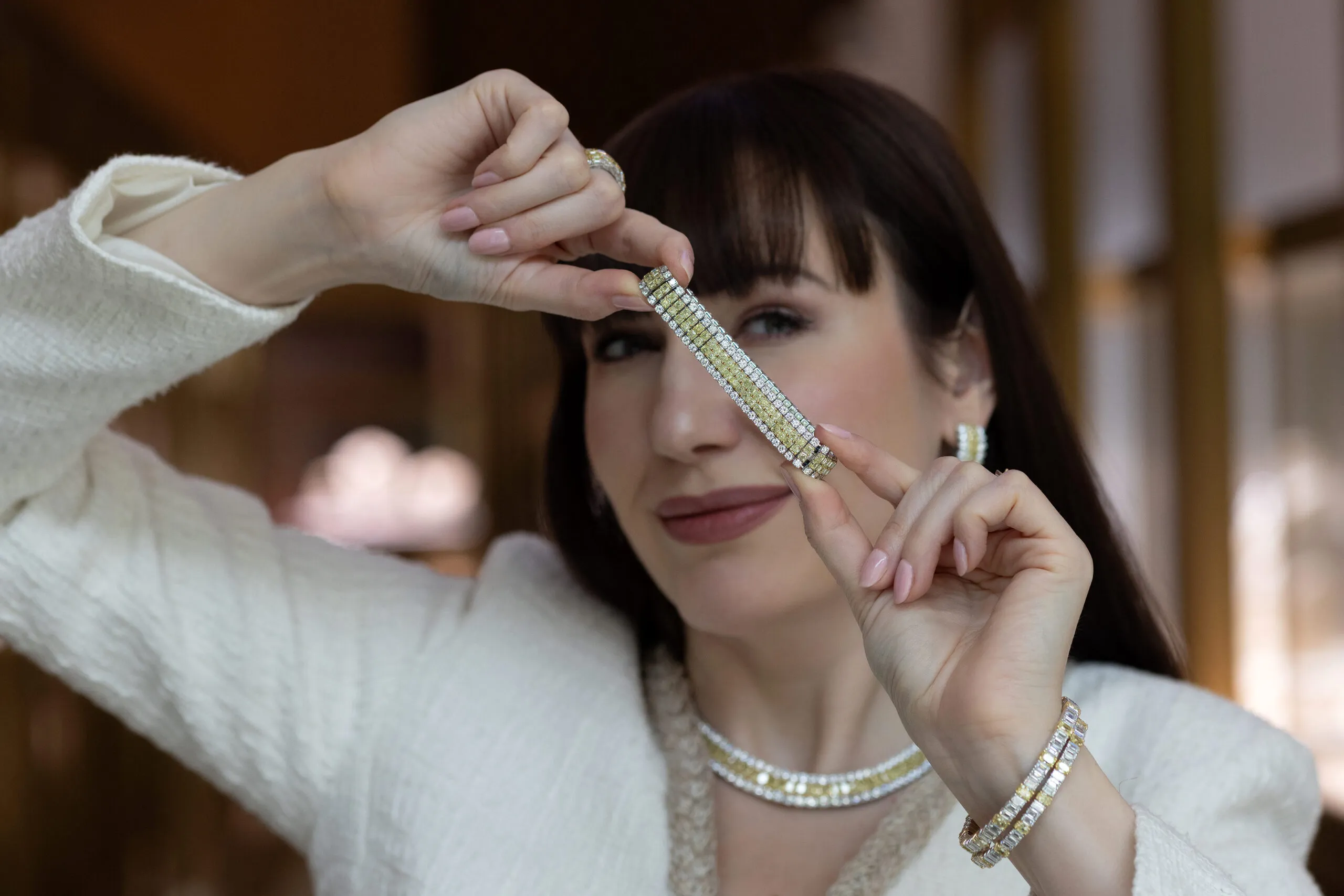 <p>A new “Warming Trend” Xpandable bracelet features 25.72ct of square emerald-cut Fancy Yellow diamonds accented by 11.69ct of round white diamonds</p>

