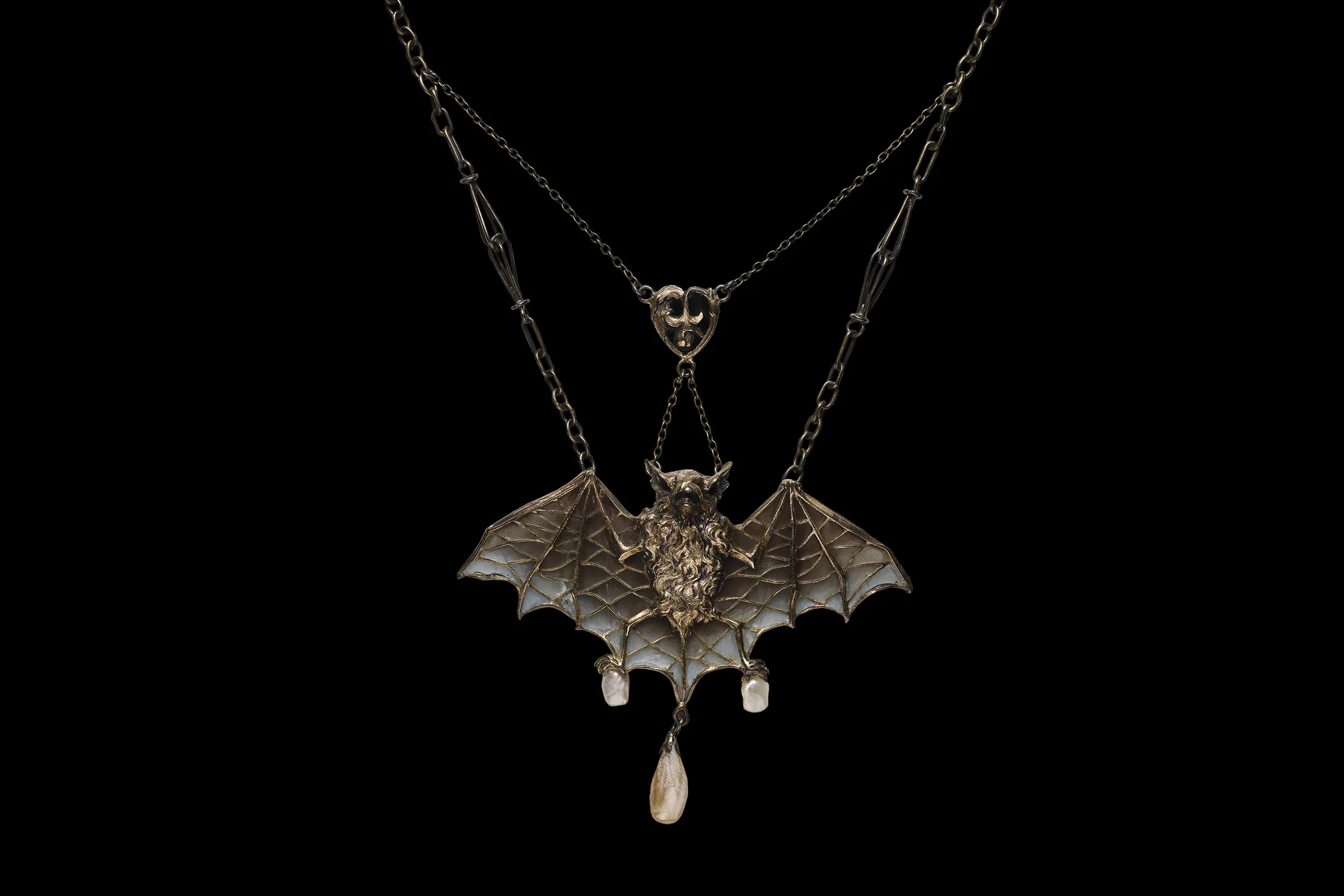 <p>Lucien Janvier Bat necklace, circa 1900, in silver, gold, pearl and plique-à-jour enamel, from the Collection of Neil Lane. Photograph © Lendon Flanagan</p>

