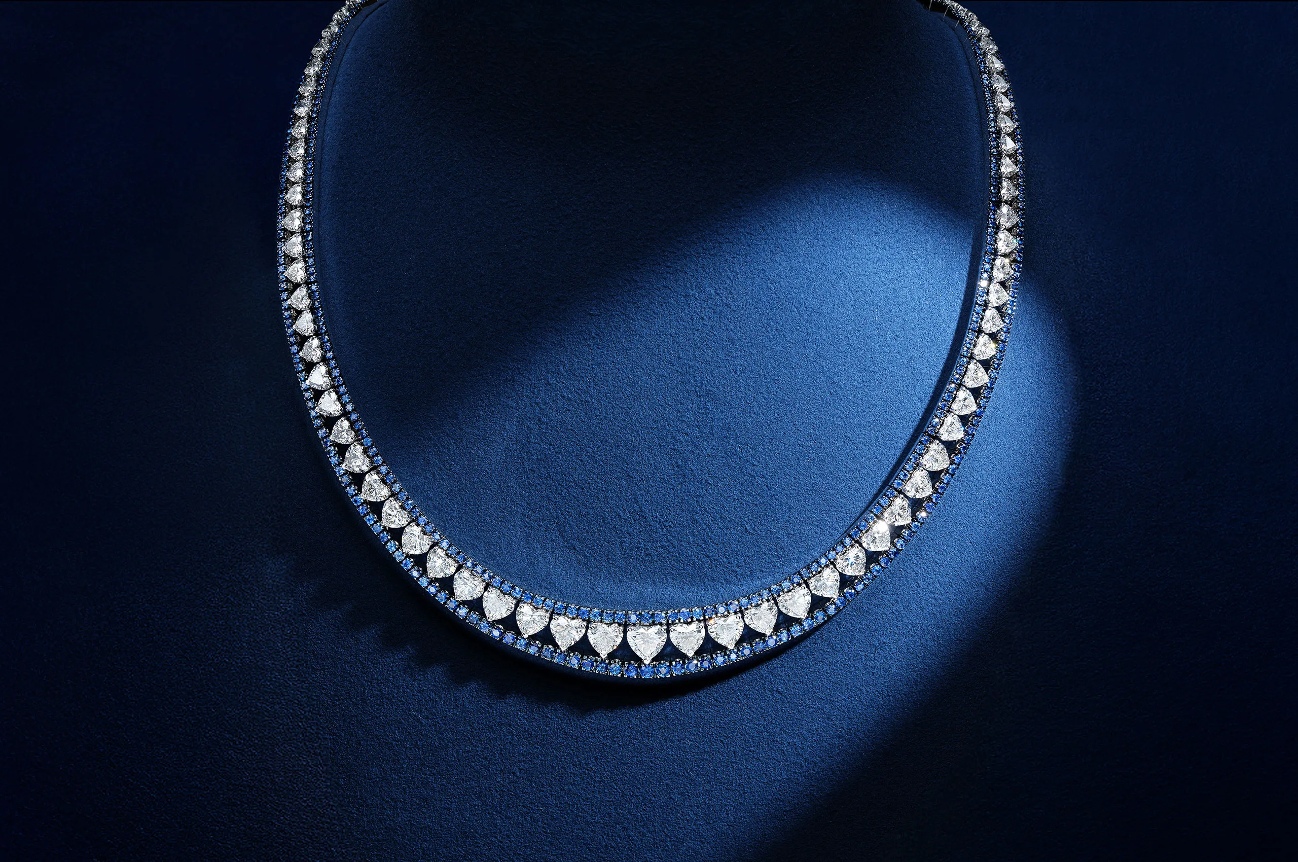 Recarlo's Oriental Night High Jewellery necklace brings together 101 graduated heart-cut diamonds totalling 32.76 carats with blue sapphires
