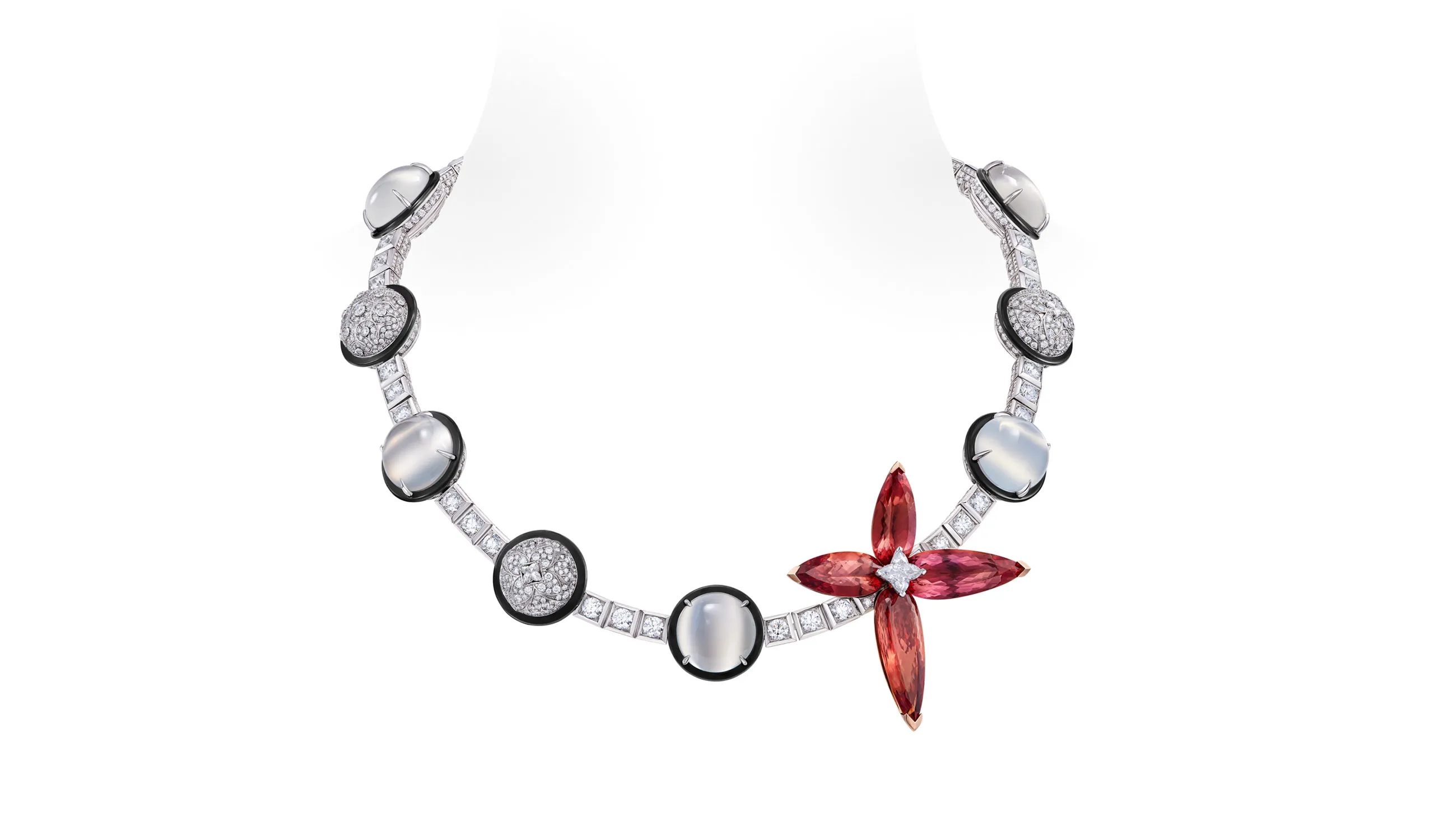 <p>The Spell high jewellery necklace in 18k white and rose gold, set with orange-pink topazes, Cat’s Eye moonstones and diamonds</p>
