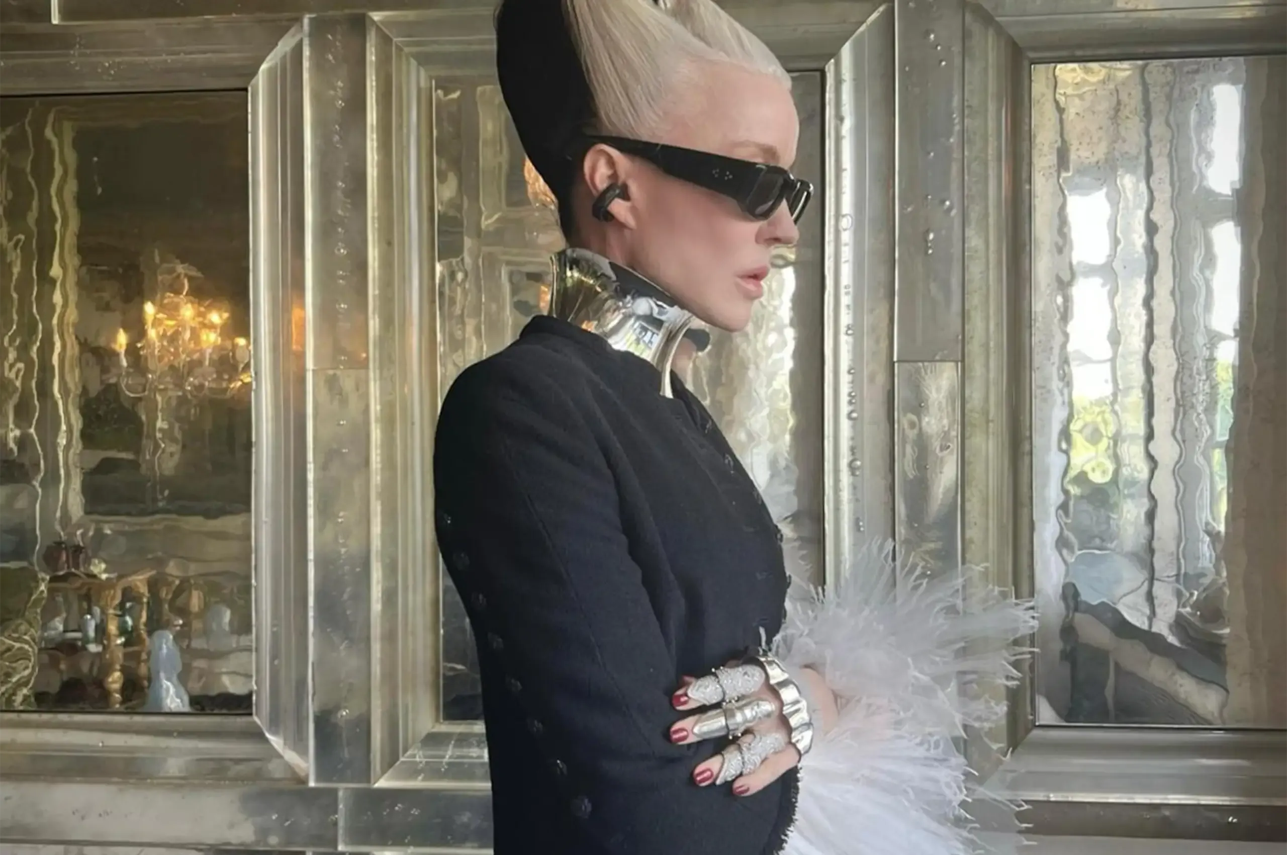 Daphne Guinness wearing a silver collar by Shaun Leane's label "12".